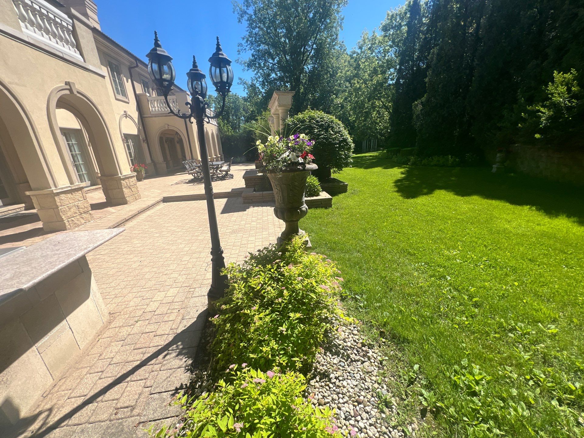 concrete cleaning using Algaecide, soft wash soap by Northern Power Washing LLC.