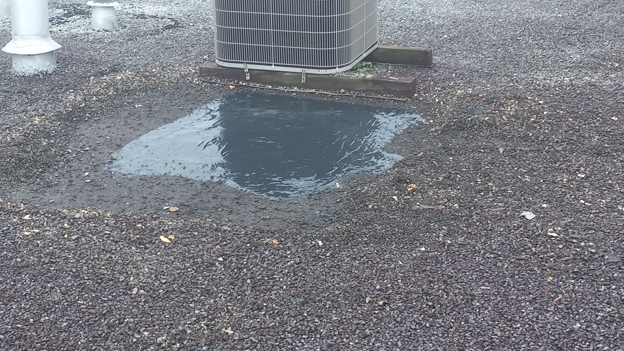 Commercial Roofing Repair using Everest Silicone Coating by Georgia Roof Advisors