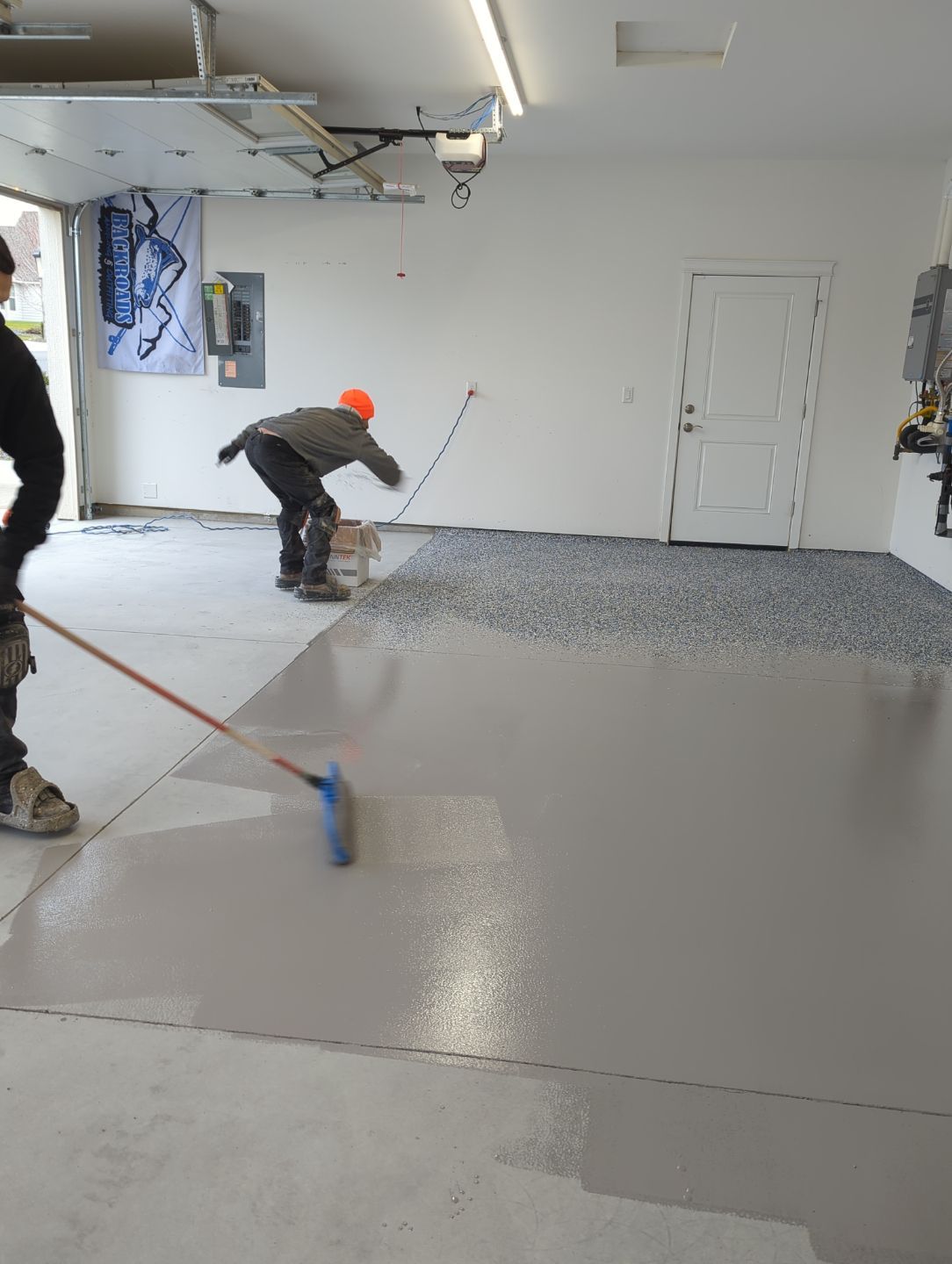Garage Transformation using Domino with Blue by Croc Coatings, LLC