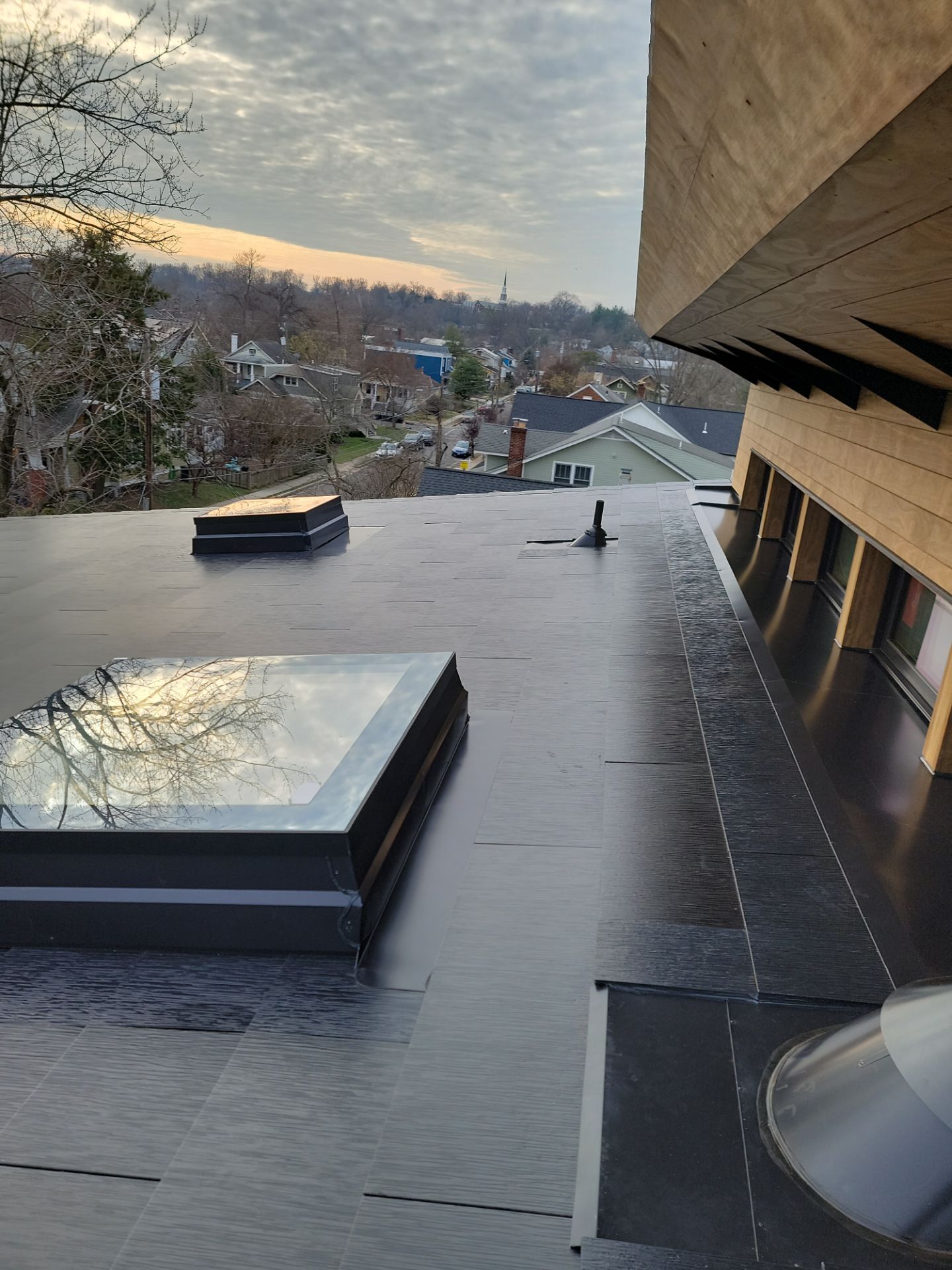 Tesla Solar Roof using SPAN smart electrical panel by American Home Contractors