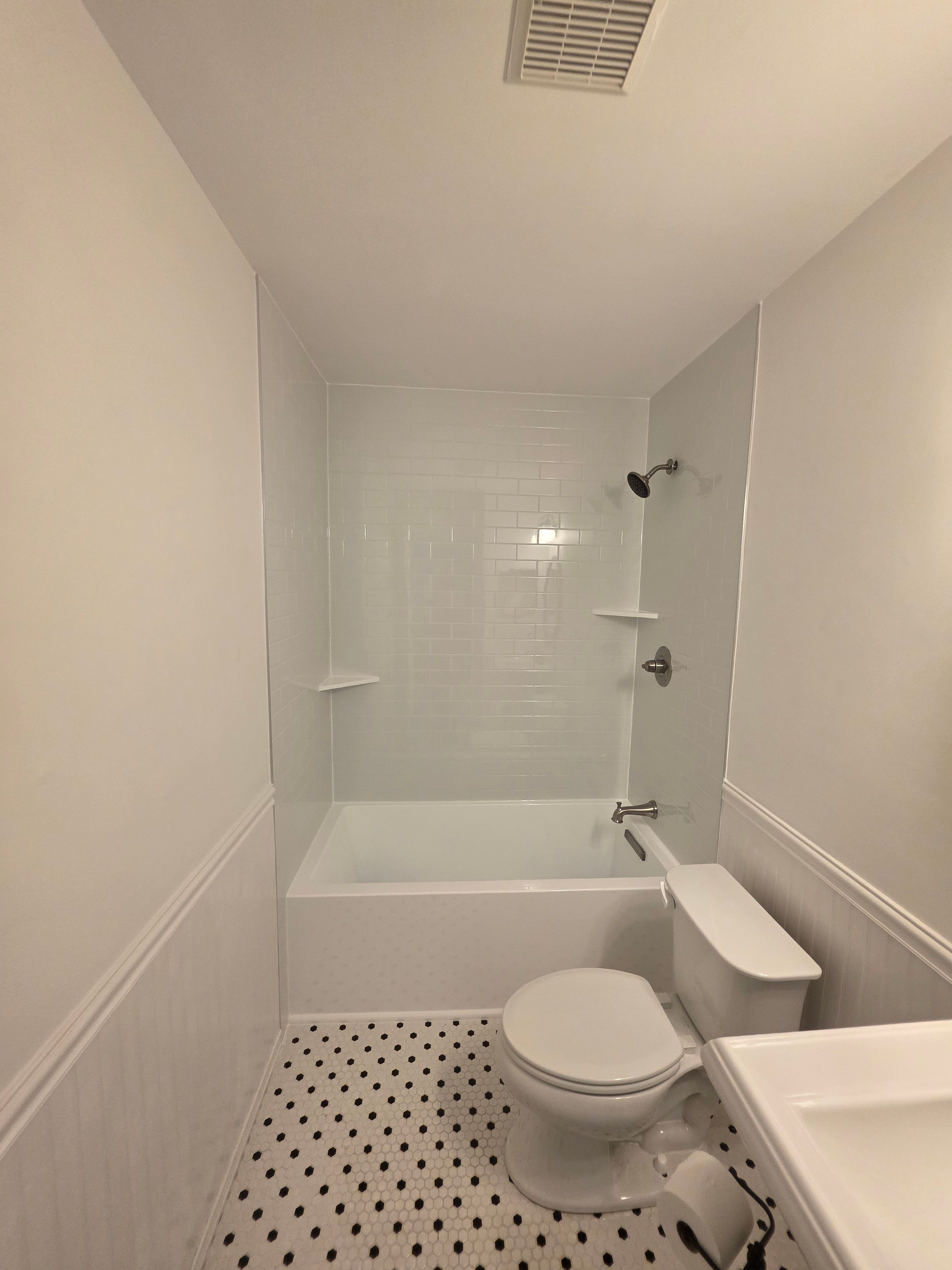 Modern Bathroom Remodel Featuring Subway Tile Surround in Deale by Window Depot of Annapolis