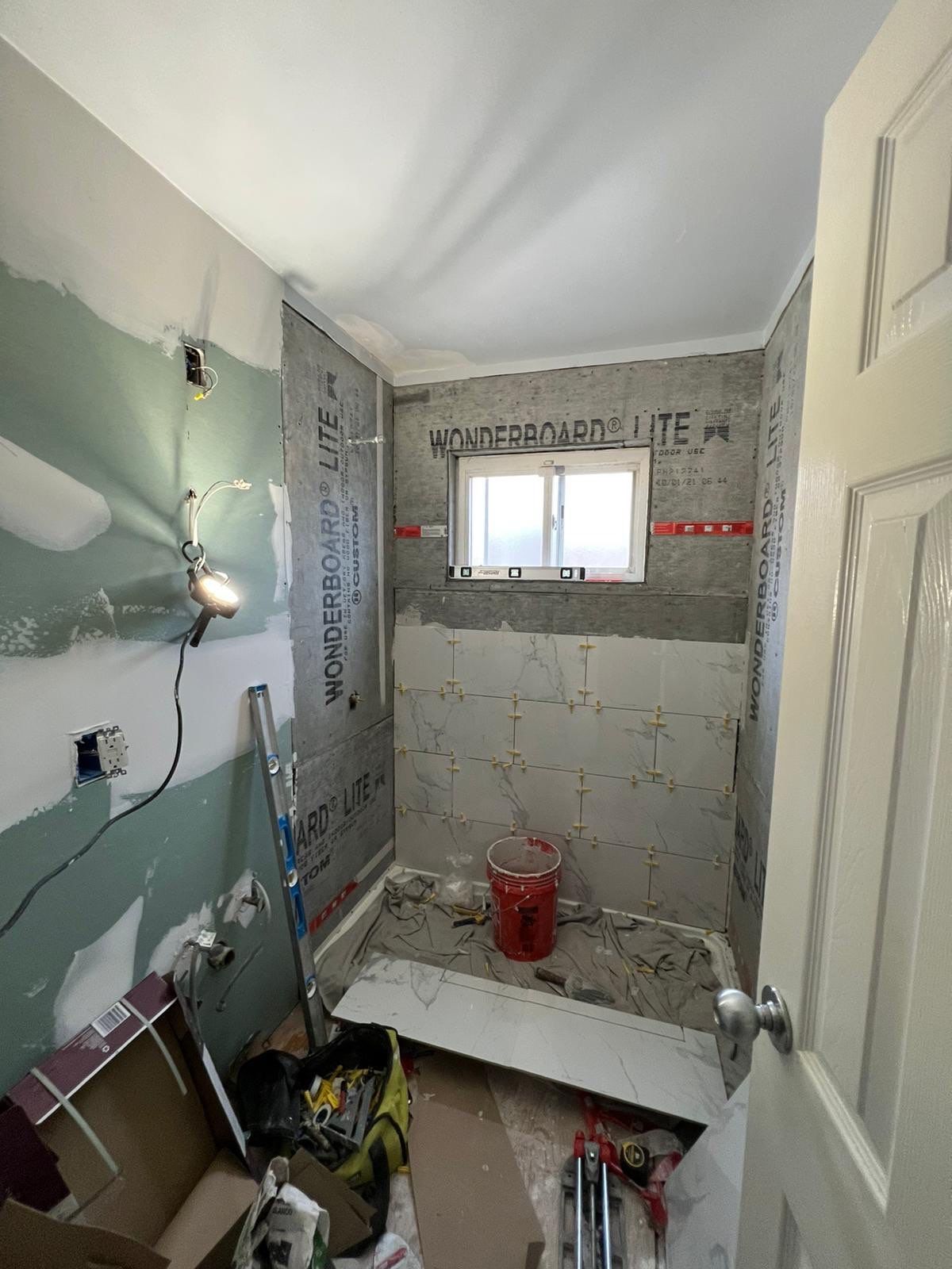 Bathroom Remodel using Tile by Home Concepts Construction