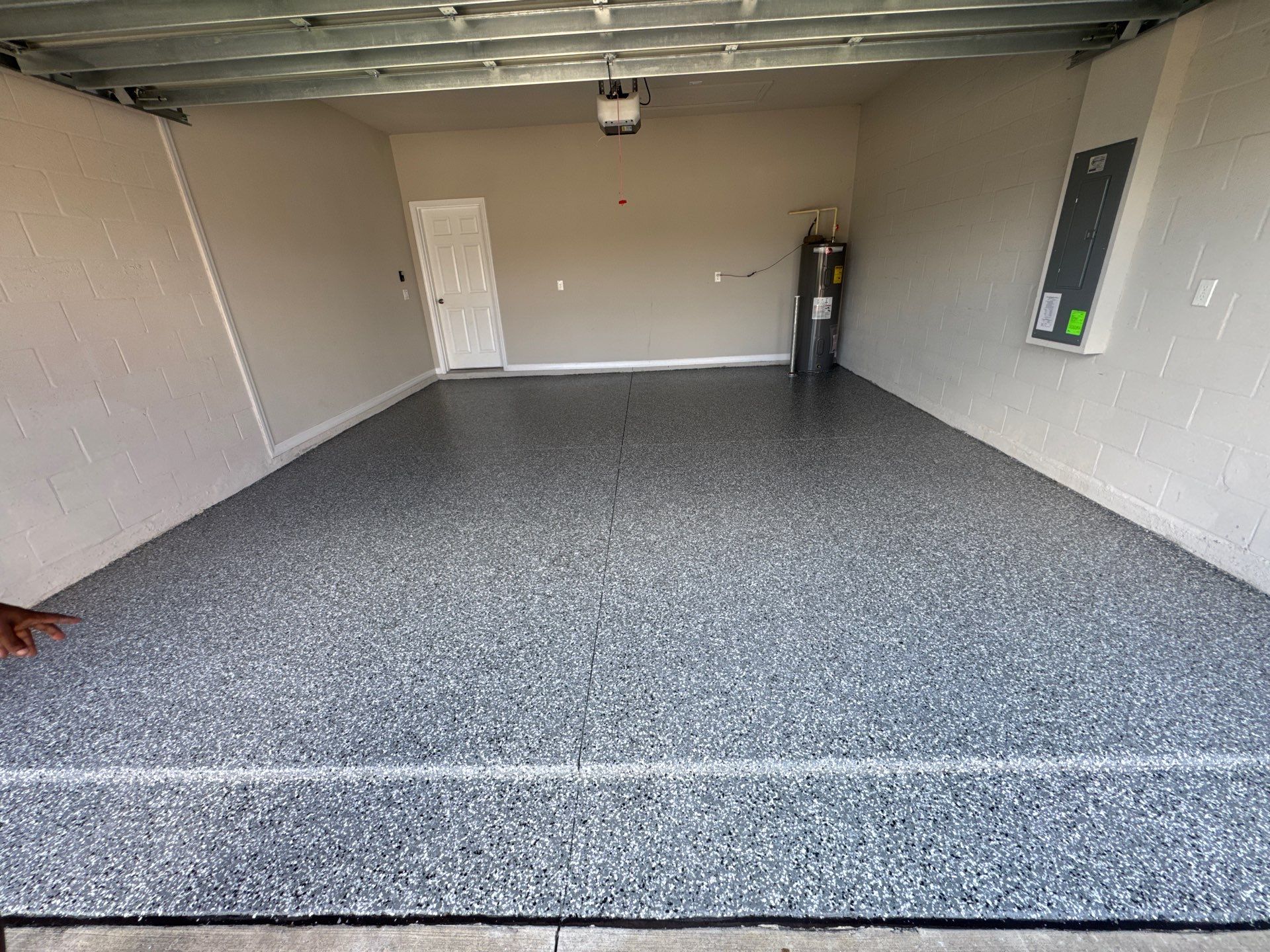 Another Wonderful Garage Transformation Using Wombat Flake by Performance Floors & Coating