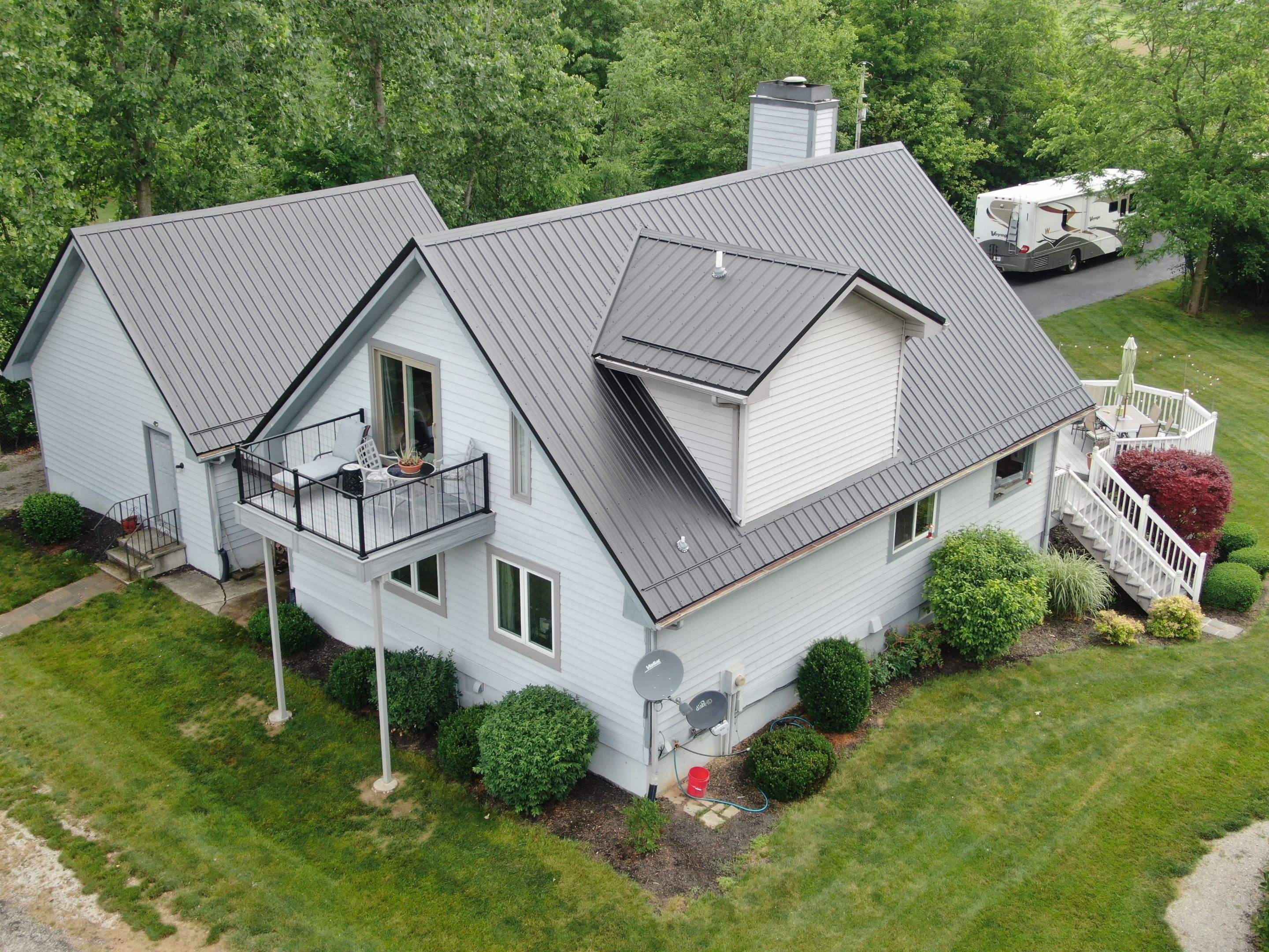 Residential Roofing Installation using Exposed Fastener Metal Roof by 4Ever Metal Roofing