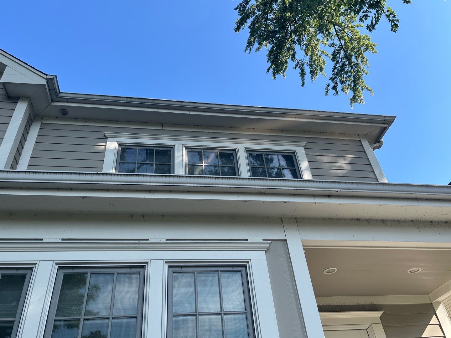 Hardie Board House & Detached Garage Soft Washing by Northern Power Washing LLC.