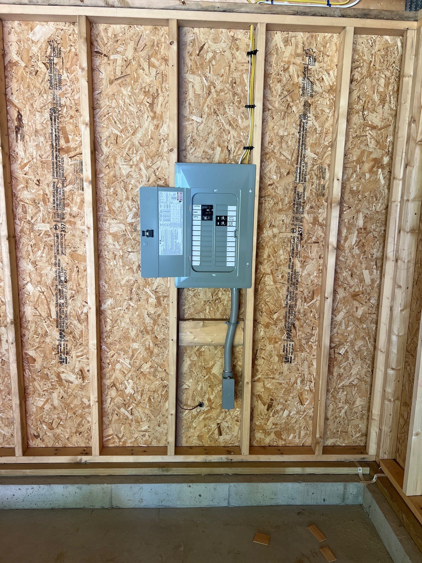 Two-Car Garage using LP SmartSide Panel Siding by Chagnon Building & Remodeling LLC