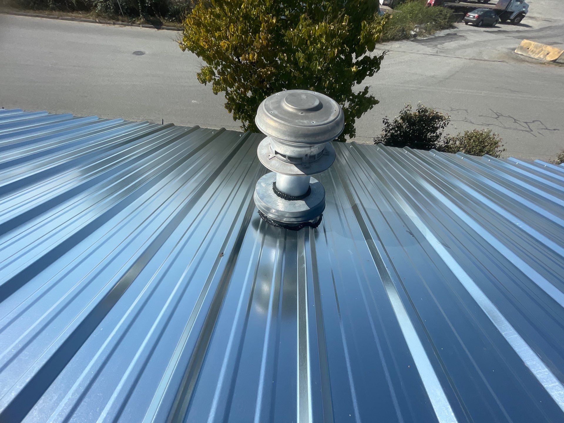 Commercial Re-Roof using Galvanized Duroclad by Top Notch Roofing Inc