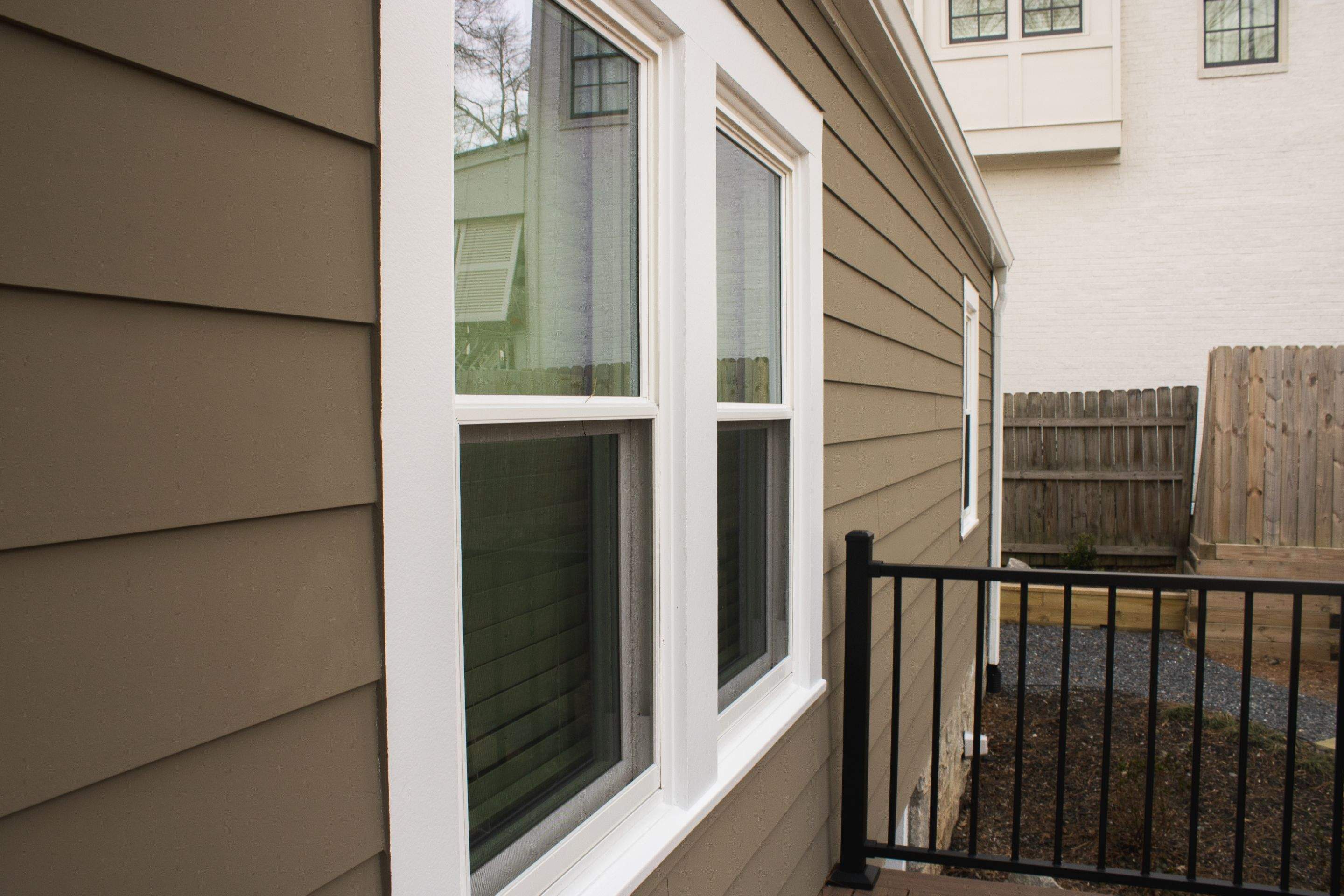 Full Siding Replacement, Deck Build, Exterior Paint, and Gutter Replacement  by Nelson Exteriors 