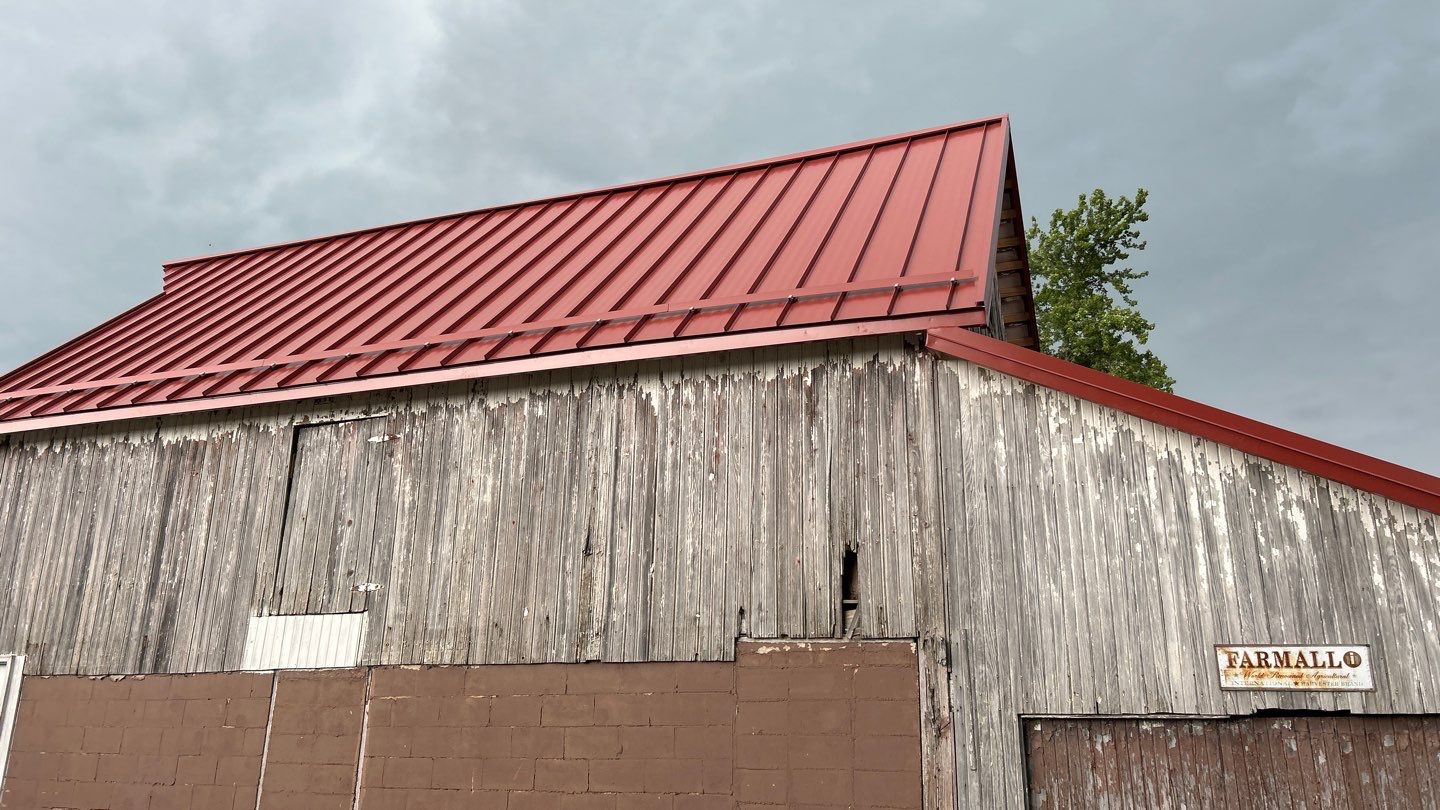 Residential Roofing Installation using Standing Seam Metal - Barn Red by RoofX 