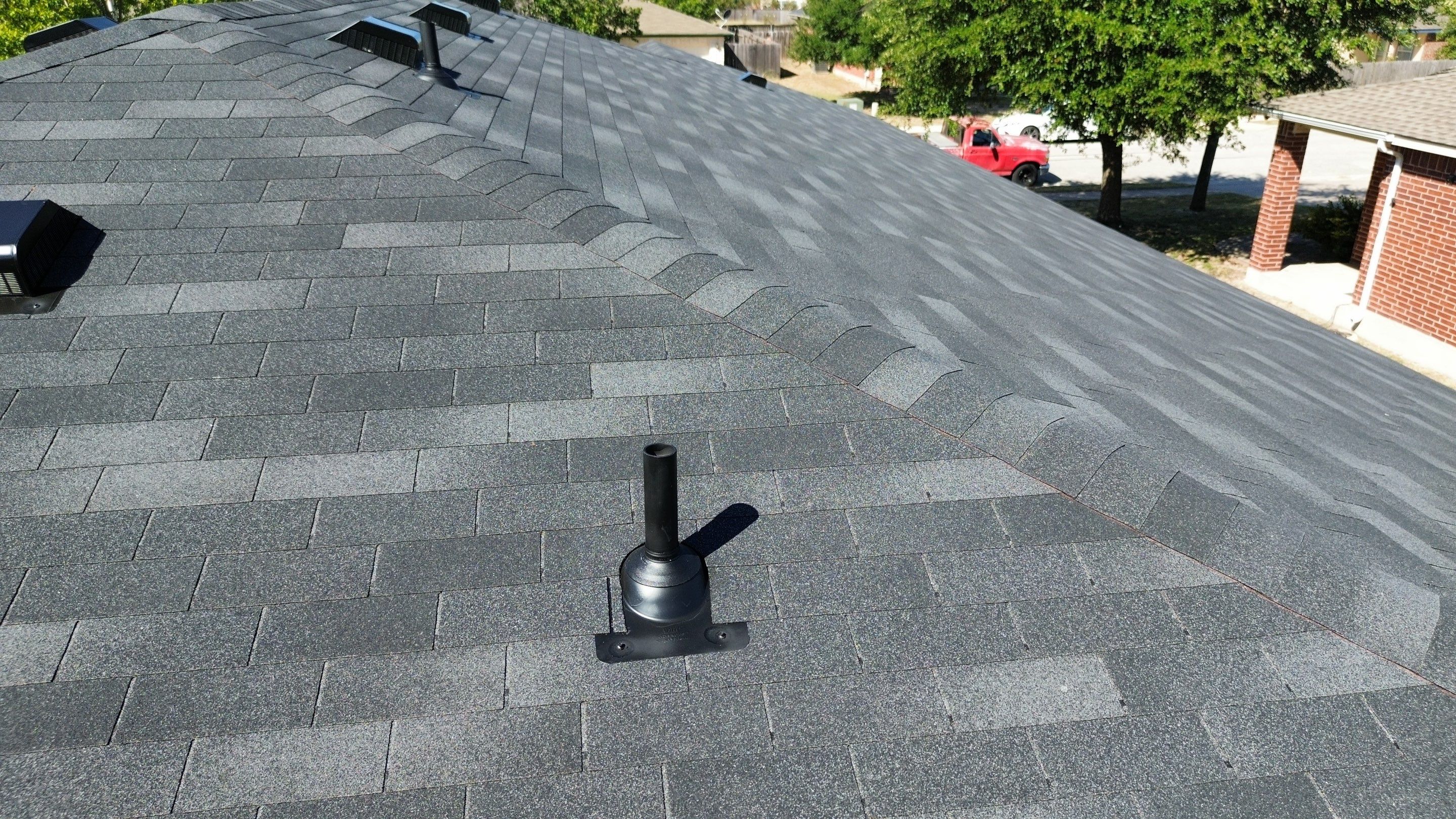 Residential Roof Installation ā Supreme Onyx Black | Leander, TX by Kstylez Roofing & Construction