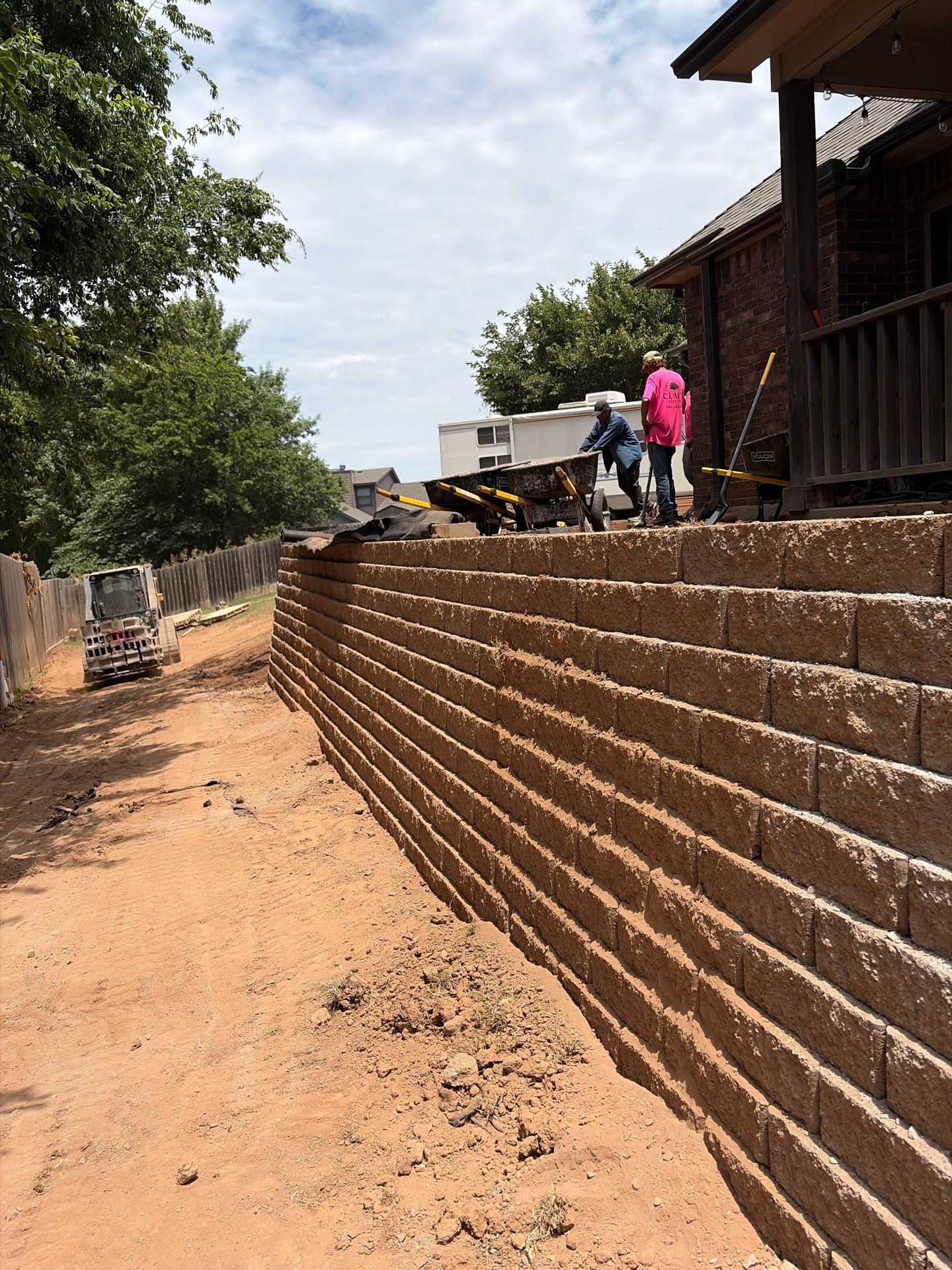 Custom Segmental Block Retaining Wall and Sod Installation in Lawton by Clays Services Inc