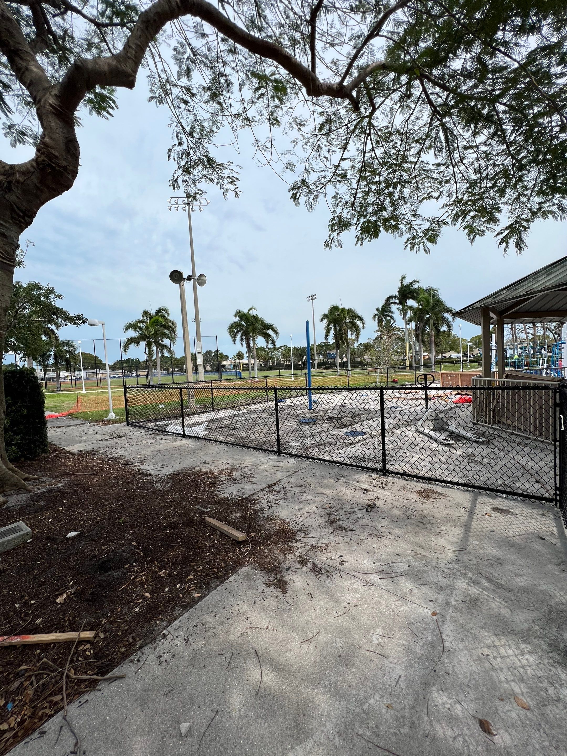 Vinyl Coated Chain-link fence for the City of Naples around Fleischmann Park Playground.  by Asap fence and gates, LLC