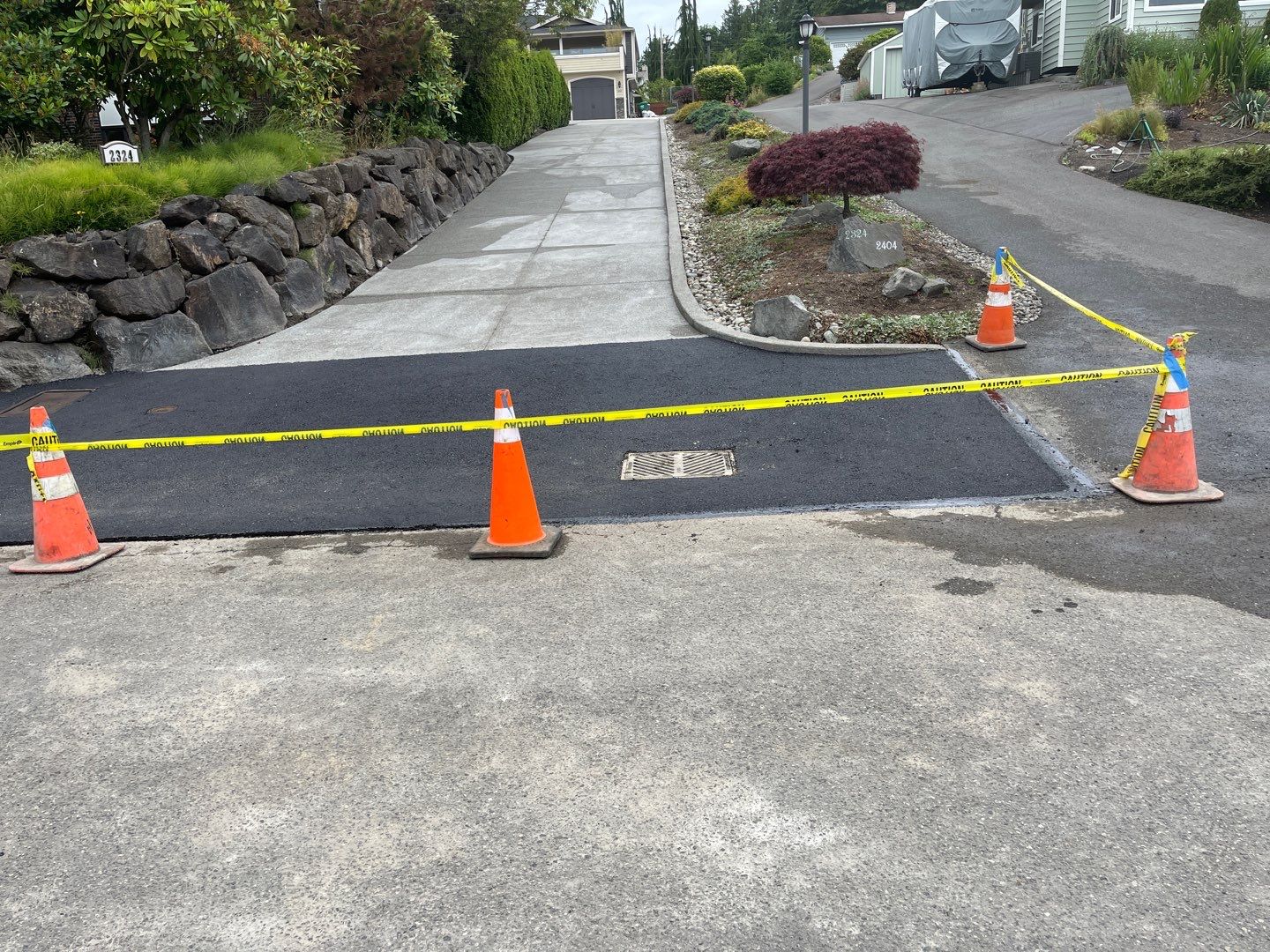 Concrete Driveway Makeover w/ Asphalt Patch | Everett  by Jireh Asphalt & Concrete Inc 