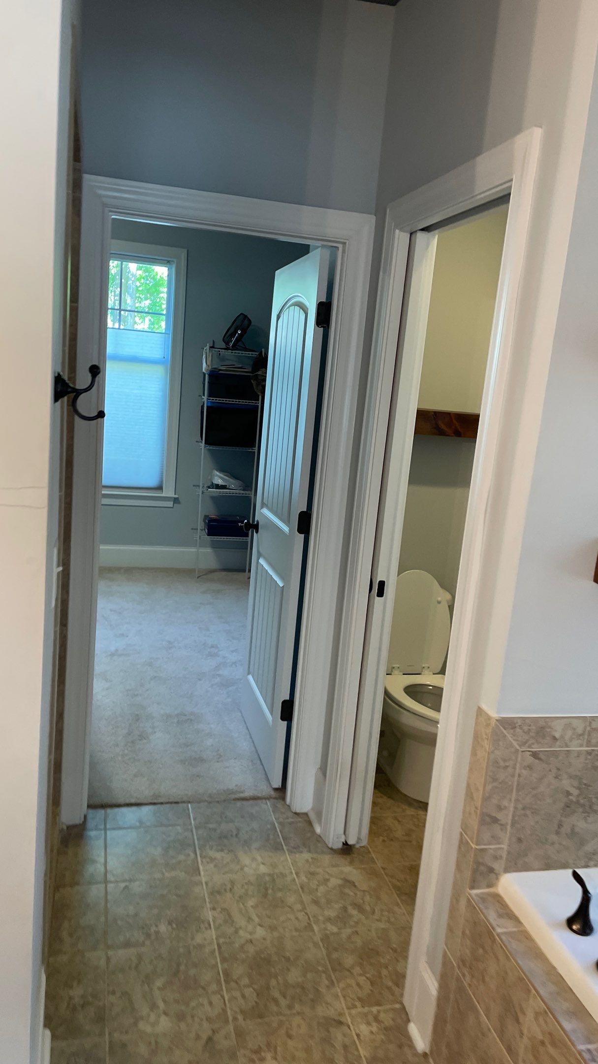 Bright Bathroom Remodel with Wall Removal, Stand Alone Tub and New Vanity by Footprints Floors of Coastal Carolina