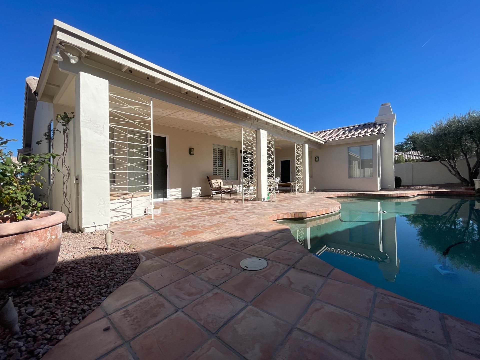 Gazzo - A Beautiful Home Exterior Transformation in Scottsdale, AZ with C&M Primer and Sherwin Williams Paints by Double G Painting Contractors, LLC