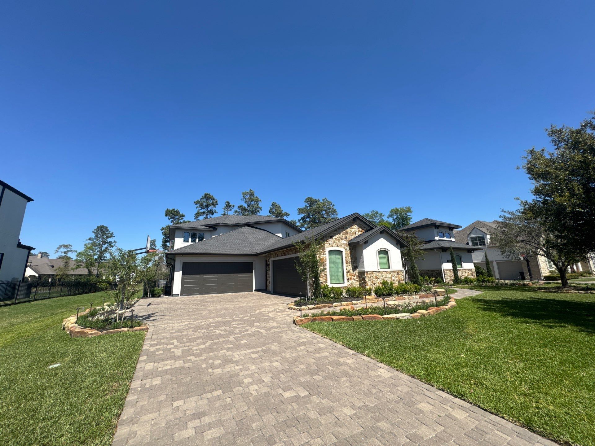 Complete Exterior Painting and Stucco Refinishing in Spring by Rolling Nations
