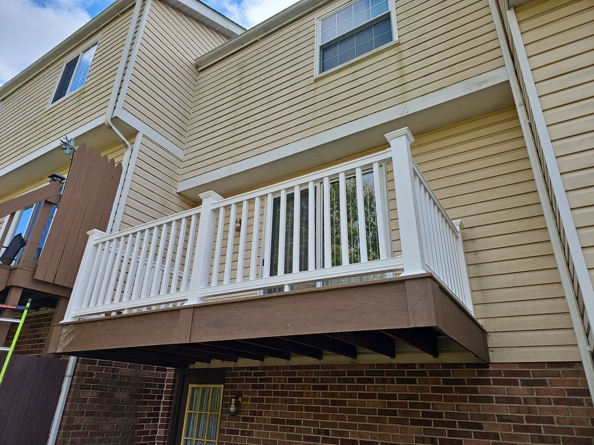 Stamped concrete and redeck  by Cousins Roofing Siding & Decks