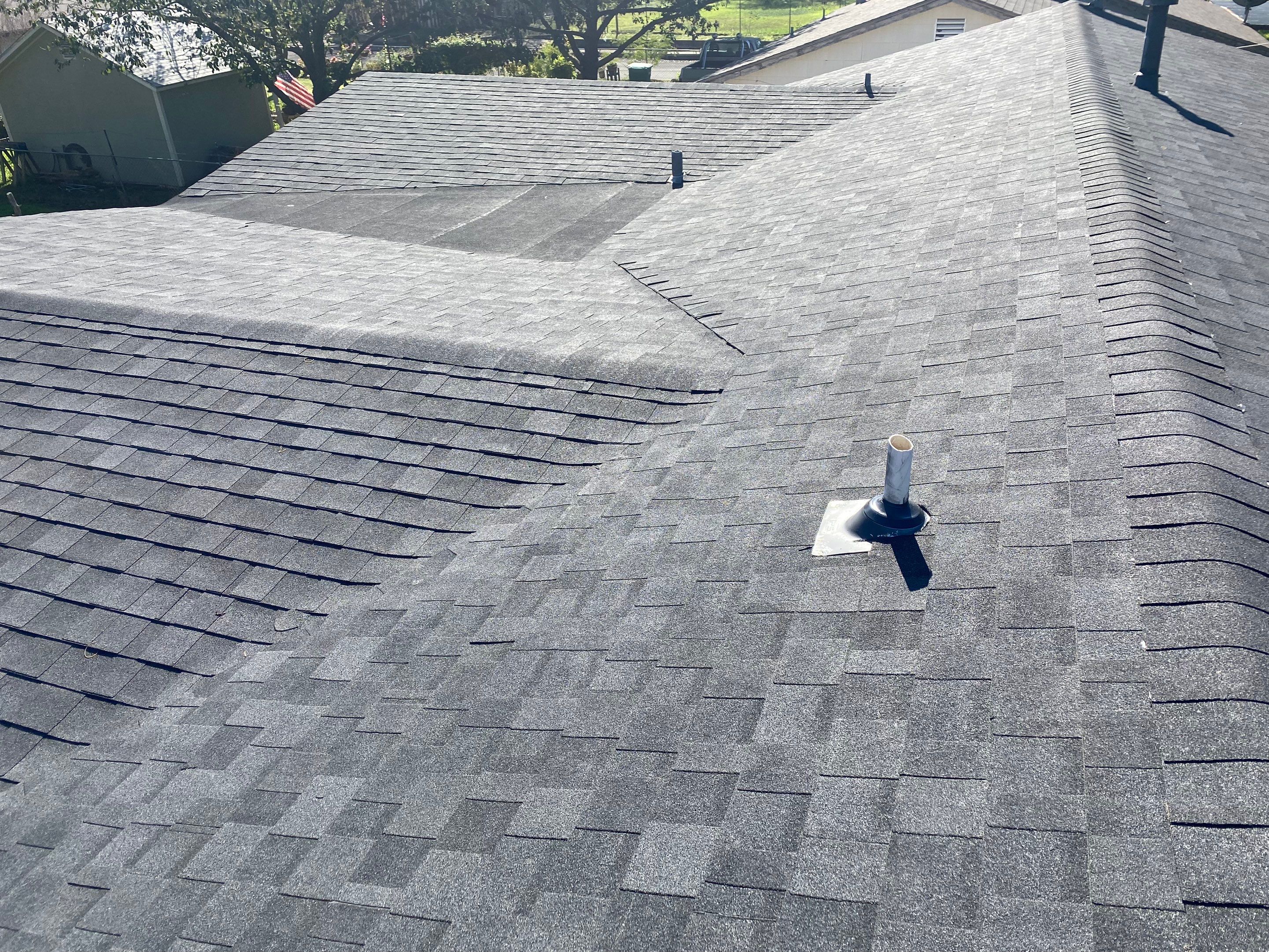 Estate Gray Shingles by Reimagine Roofing