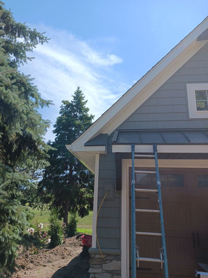 Garage Metal Roof using Standing Seam Metal by Absolute Roofing and Construction