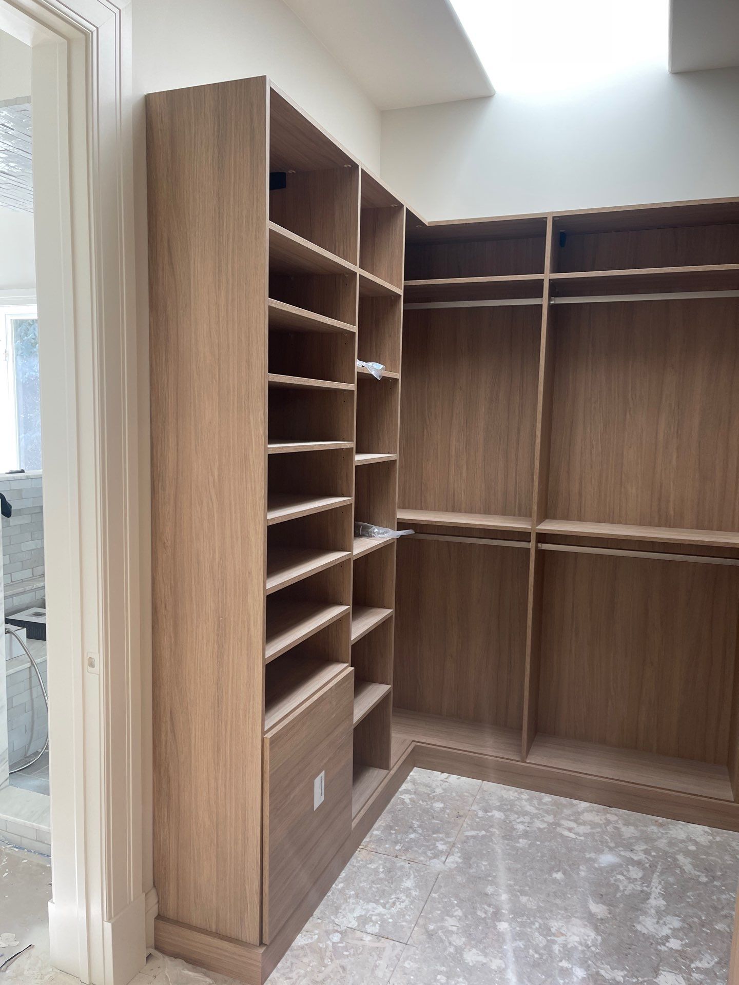 Expansive Primary Closet in Cherry Hills Village by Concept 32, Inc.