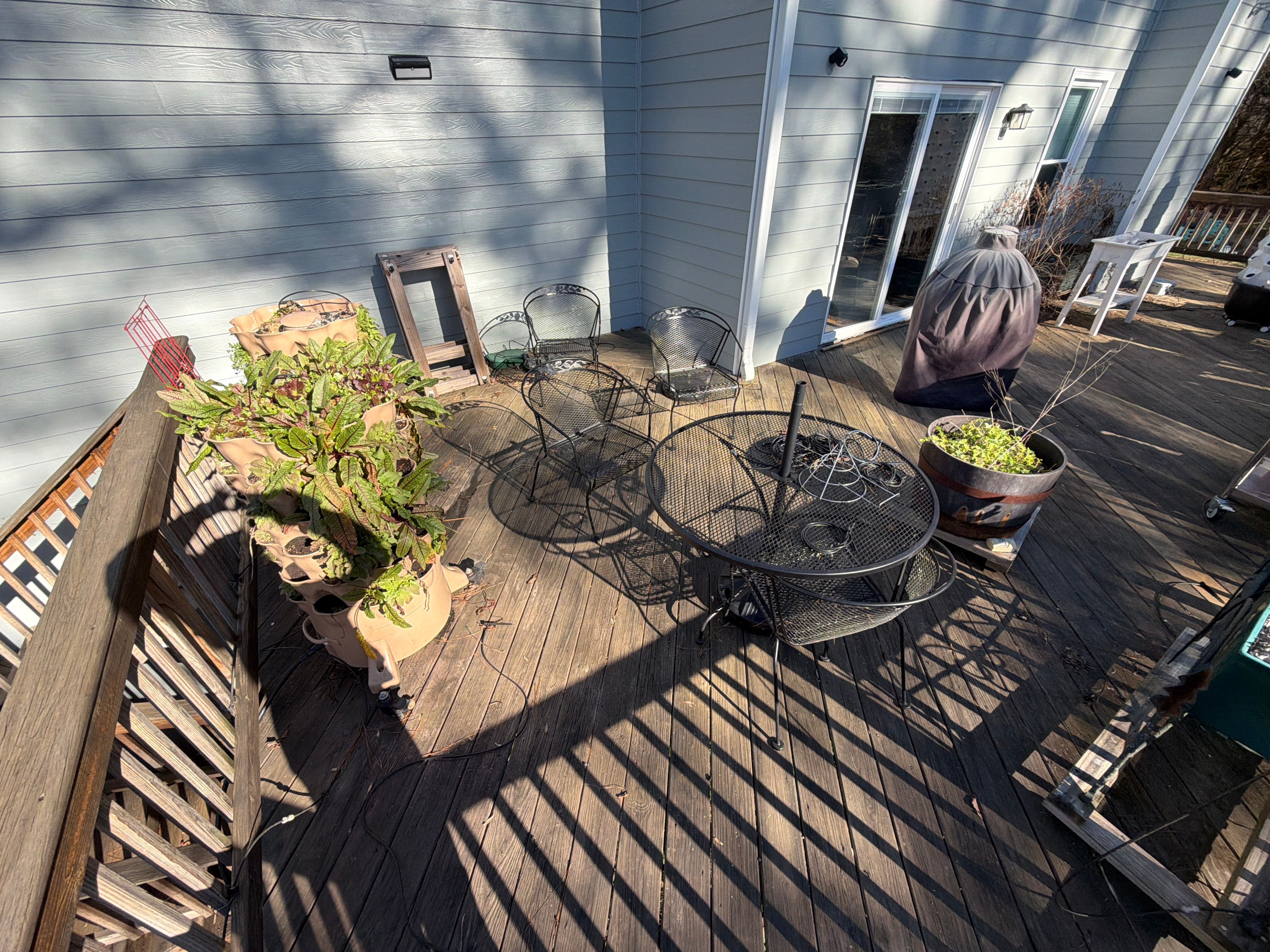 Covered Porch and Deck Build using Deckorators Venture Series Decking and Trex Select Aluminum Railing by Nelson Exteriors