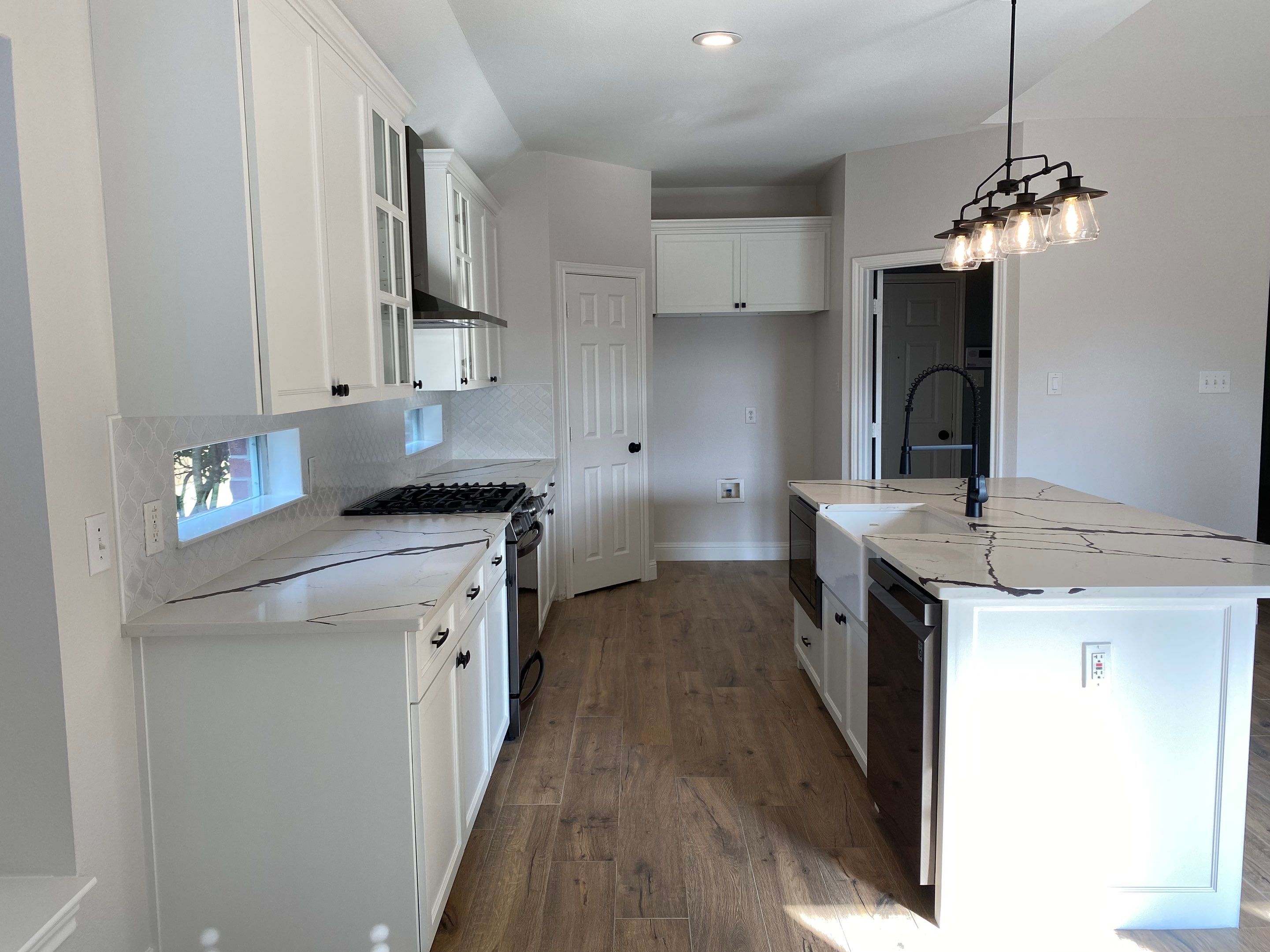 Custom cabinetry Kitchen Remodel by SLM General Contractors & Roofing