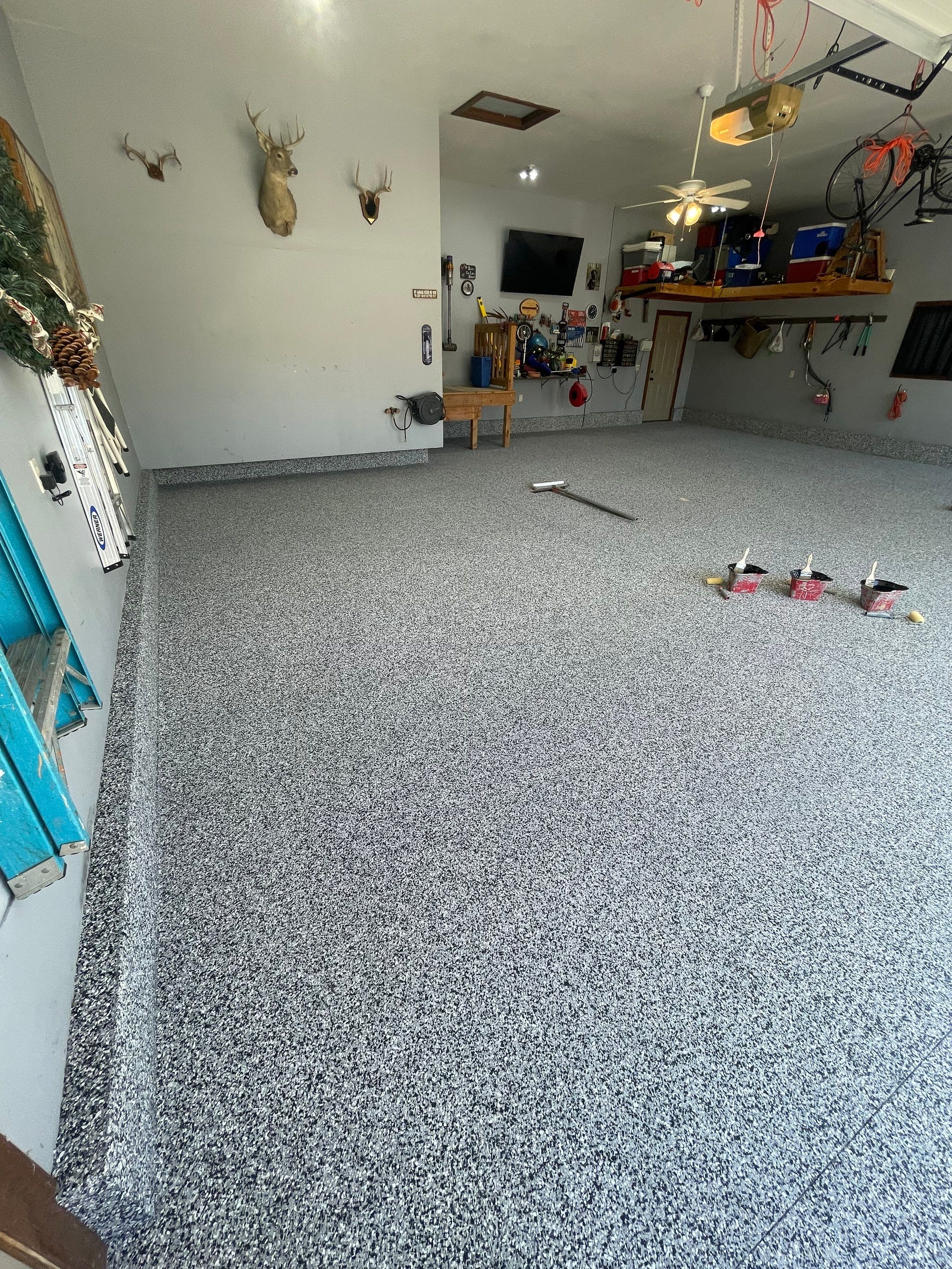 Residential Garage Floor Coating in Sioux Falls by Select Painting, Coatings & Garage Cabinets