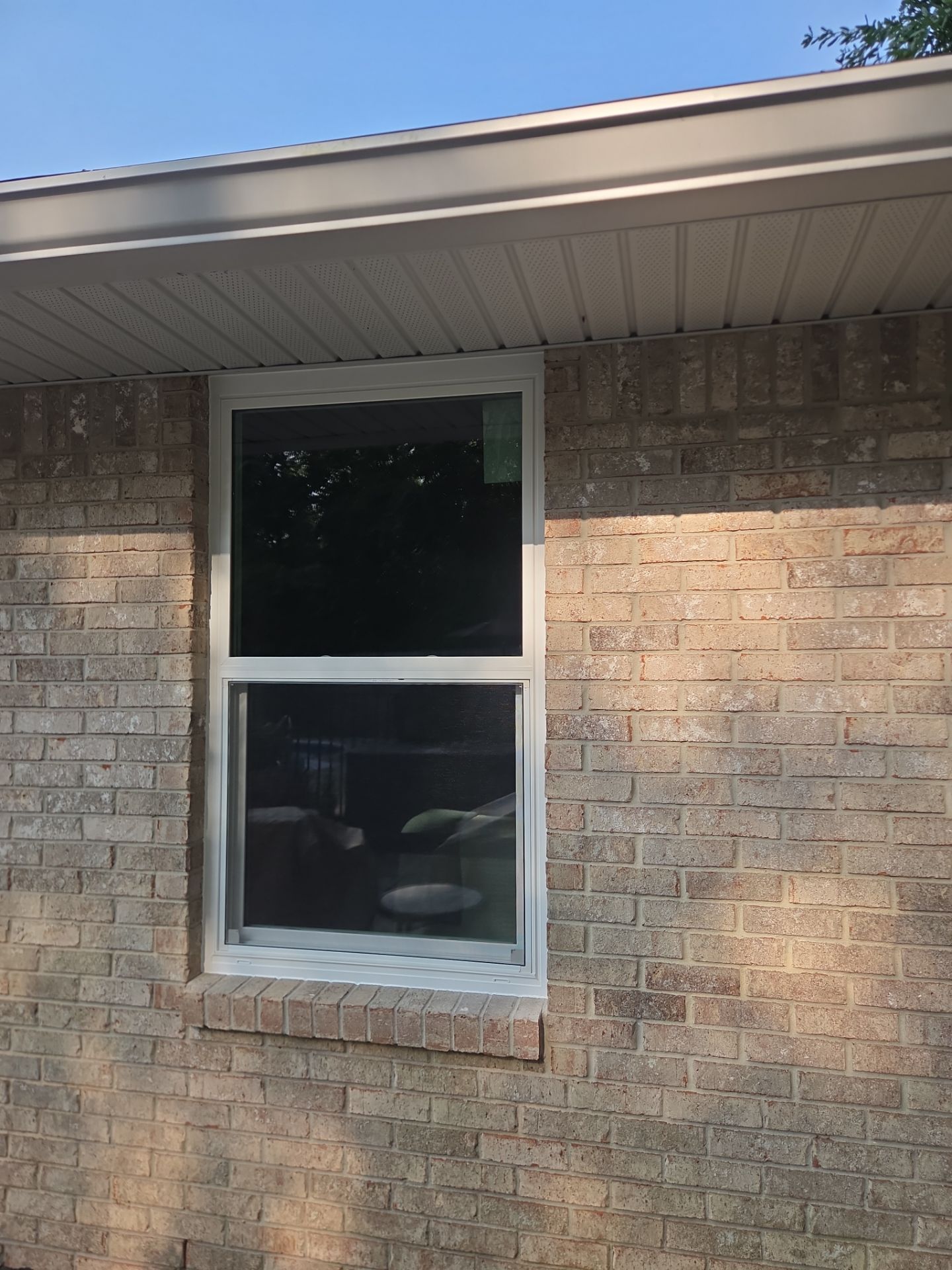 “New windows, new view, same great house!” by Folkers Window Company