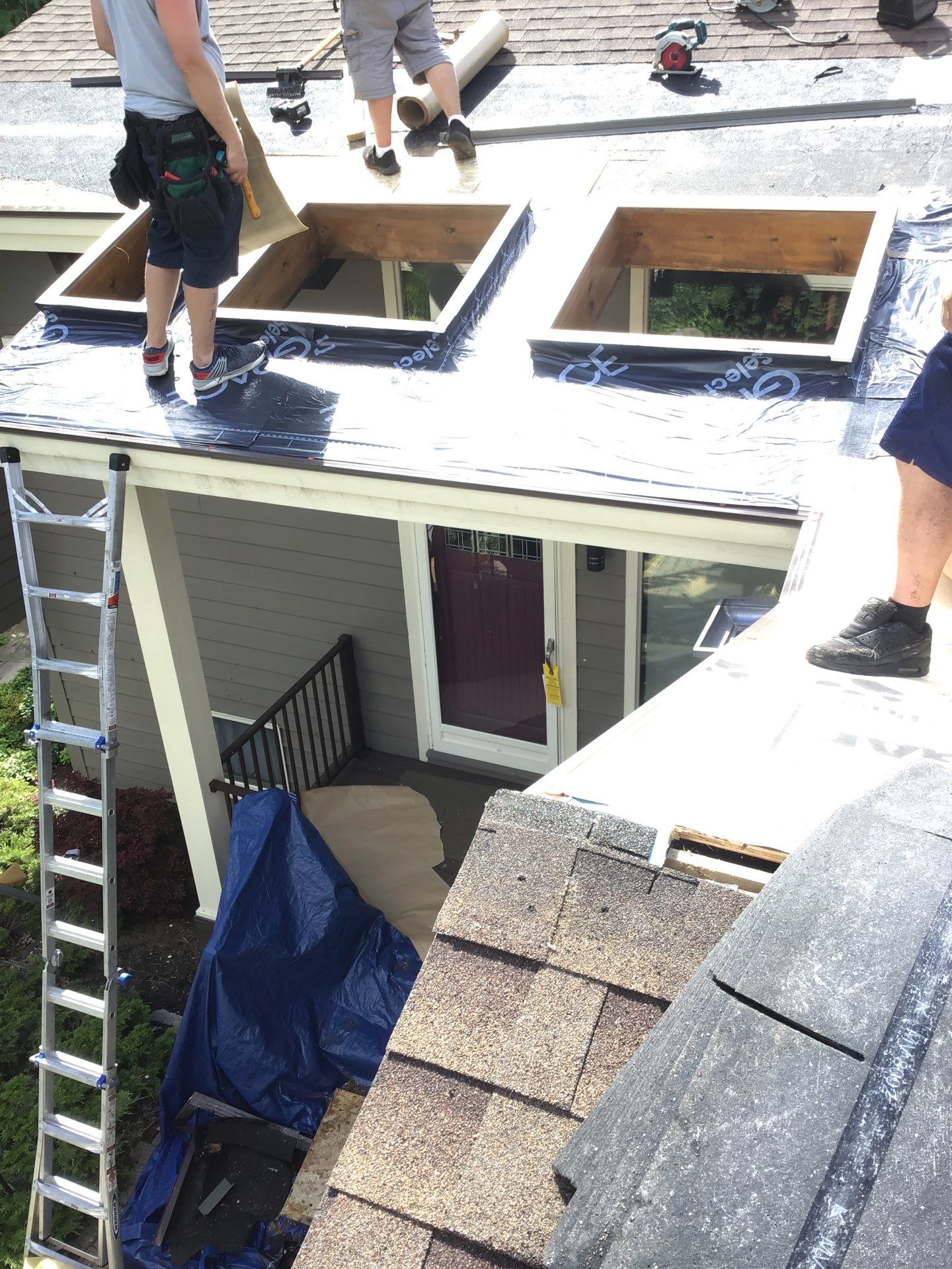 Velux Skylights, GAF Roofing, Front Porch Overhang by Northwest Construction 