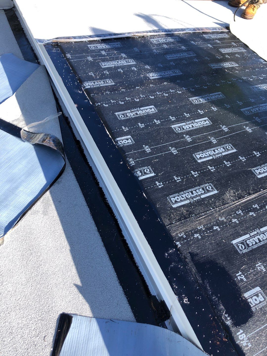 Residential Re-Roof using Polyglass Self-Adhered Flat Deck by First Due Roofing