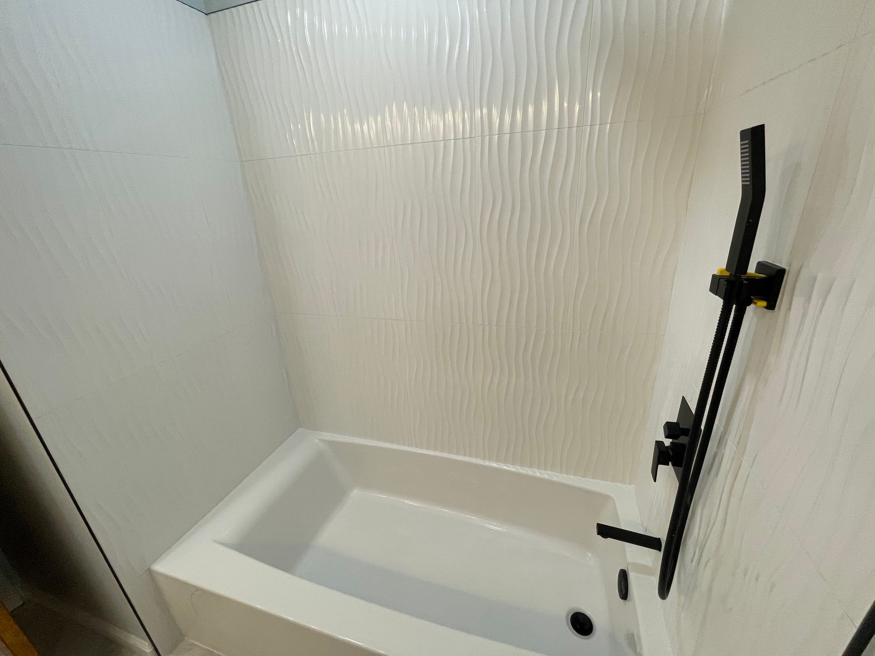 Bathroom Remodel using Tile by Home Concepts Construction