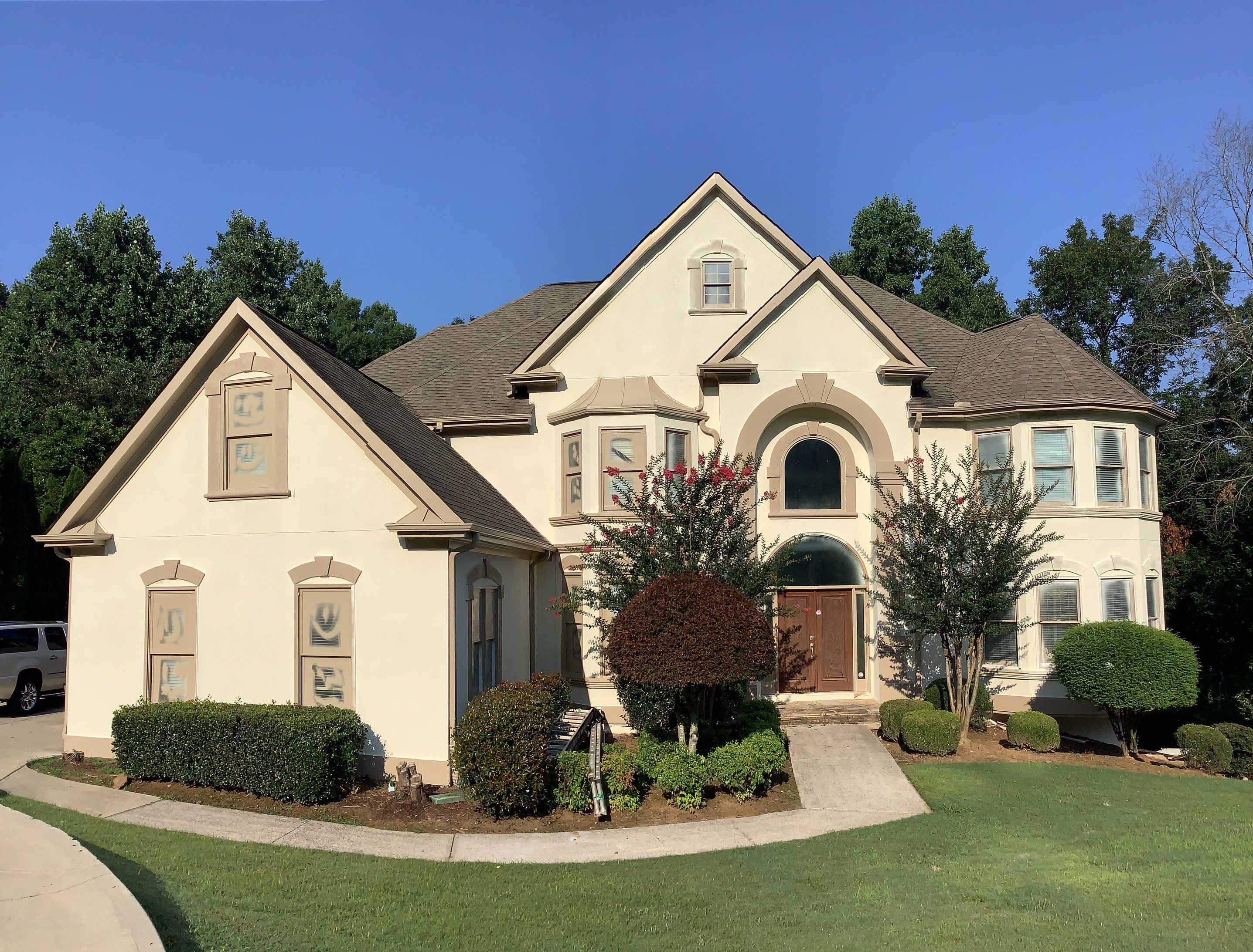 Stucco Exterior Painting and Deck Refinishing in Duluth by Swift Home Renovations