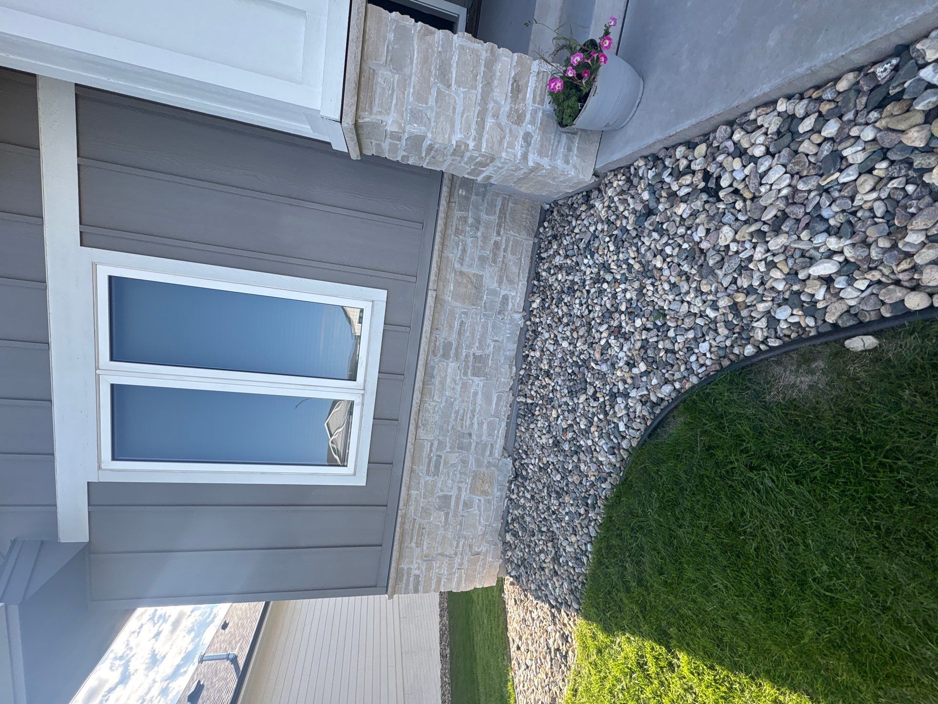 Gray Foundation Painting and Exterior Surface Refresh in Sioux Falls by Select Painting, Coatings & Garage Cabinets