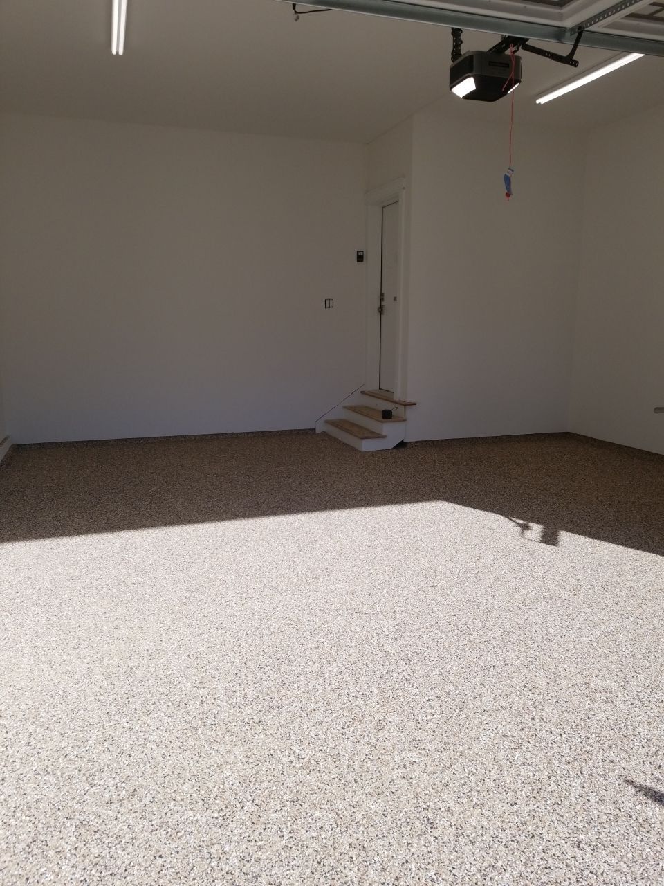 Garage Floor in Sandstone by Spectrum Painting, LLC