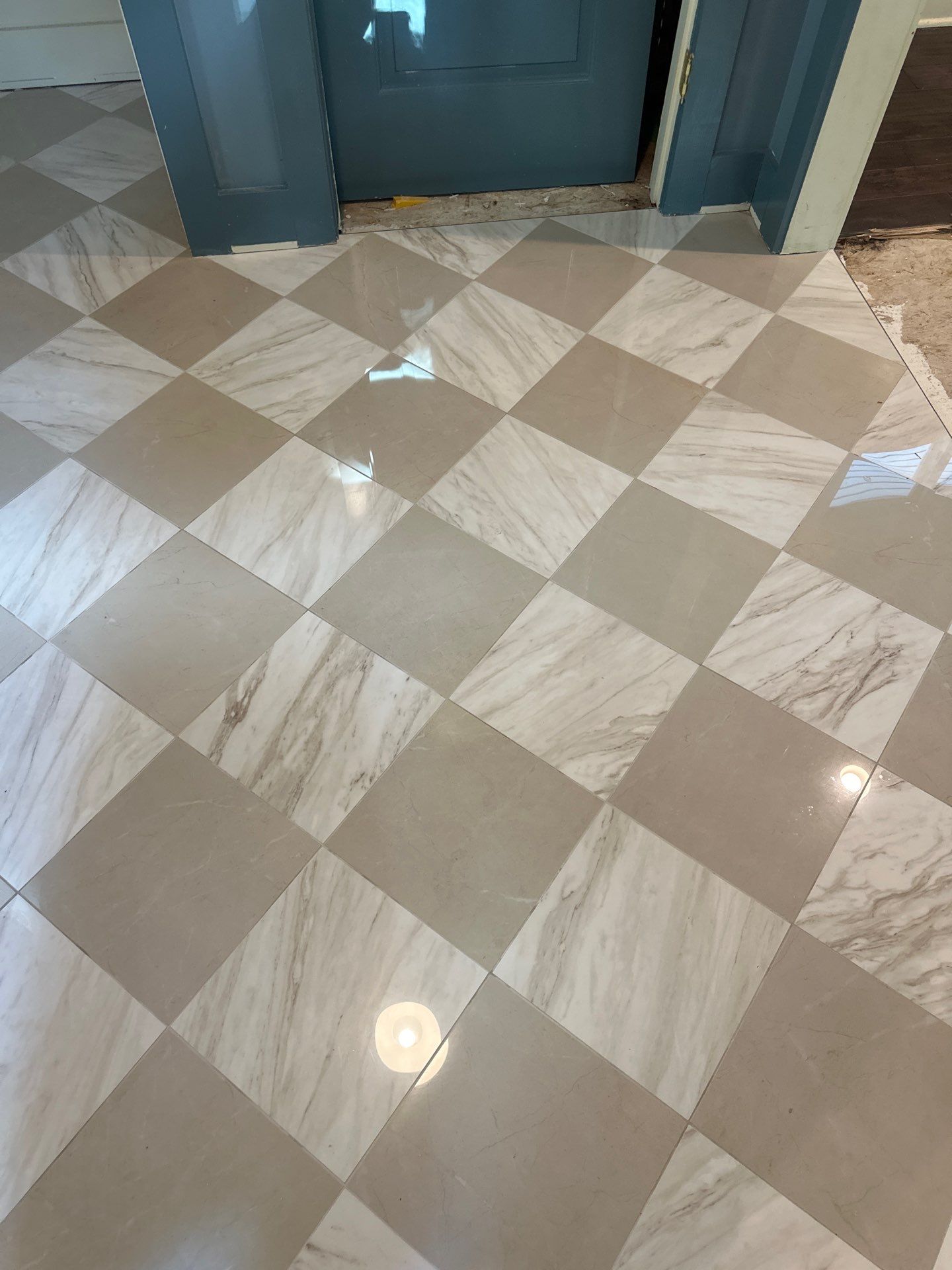 White Oak Hardwood and Checkerboard Tile Installation by Footprints Floors of Nashville