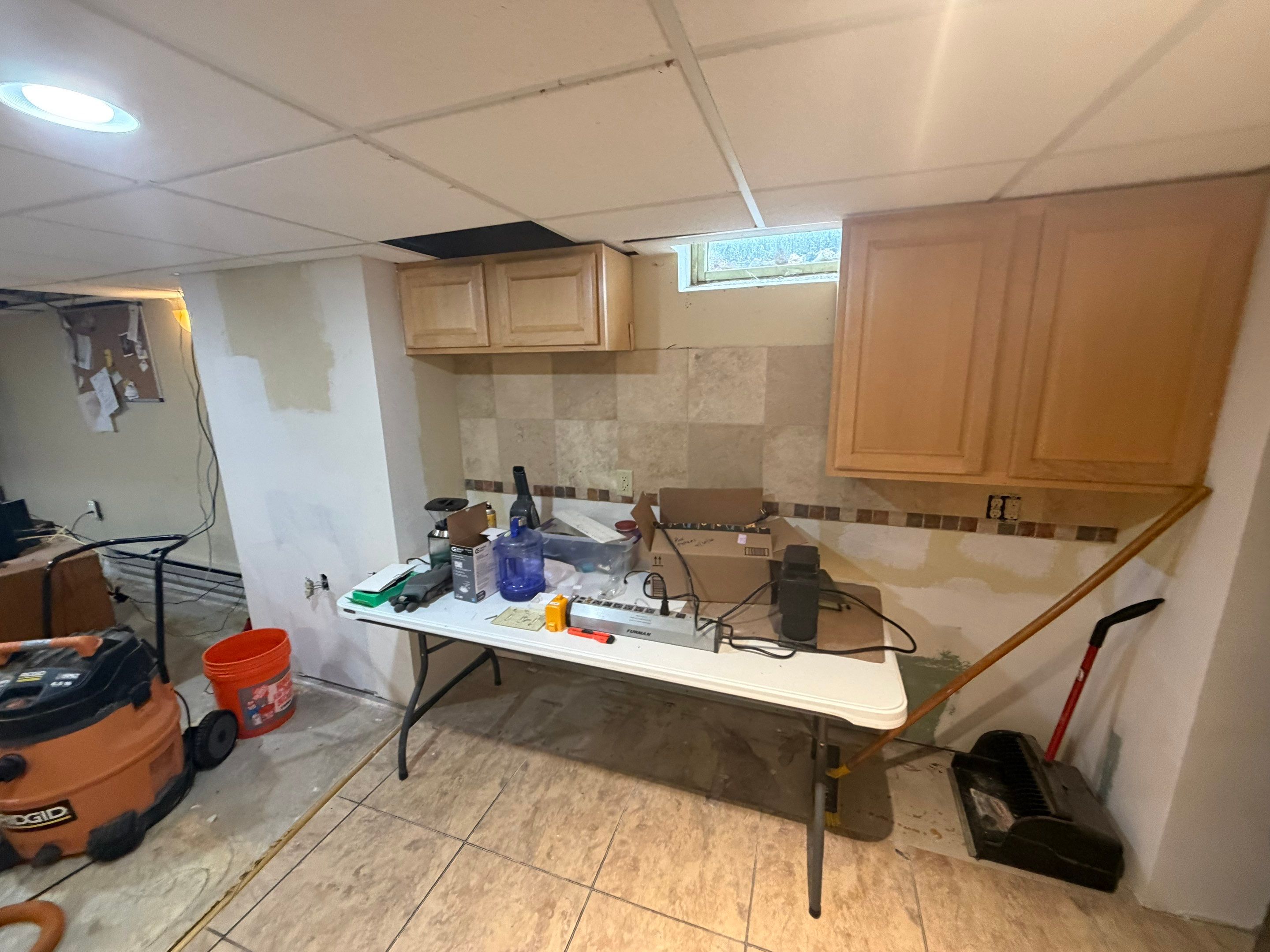 Basement Kitchen Renovation and Interior Wall Finishing in Brookfield by OCS Contracting Services