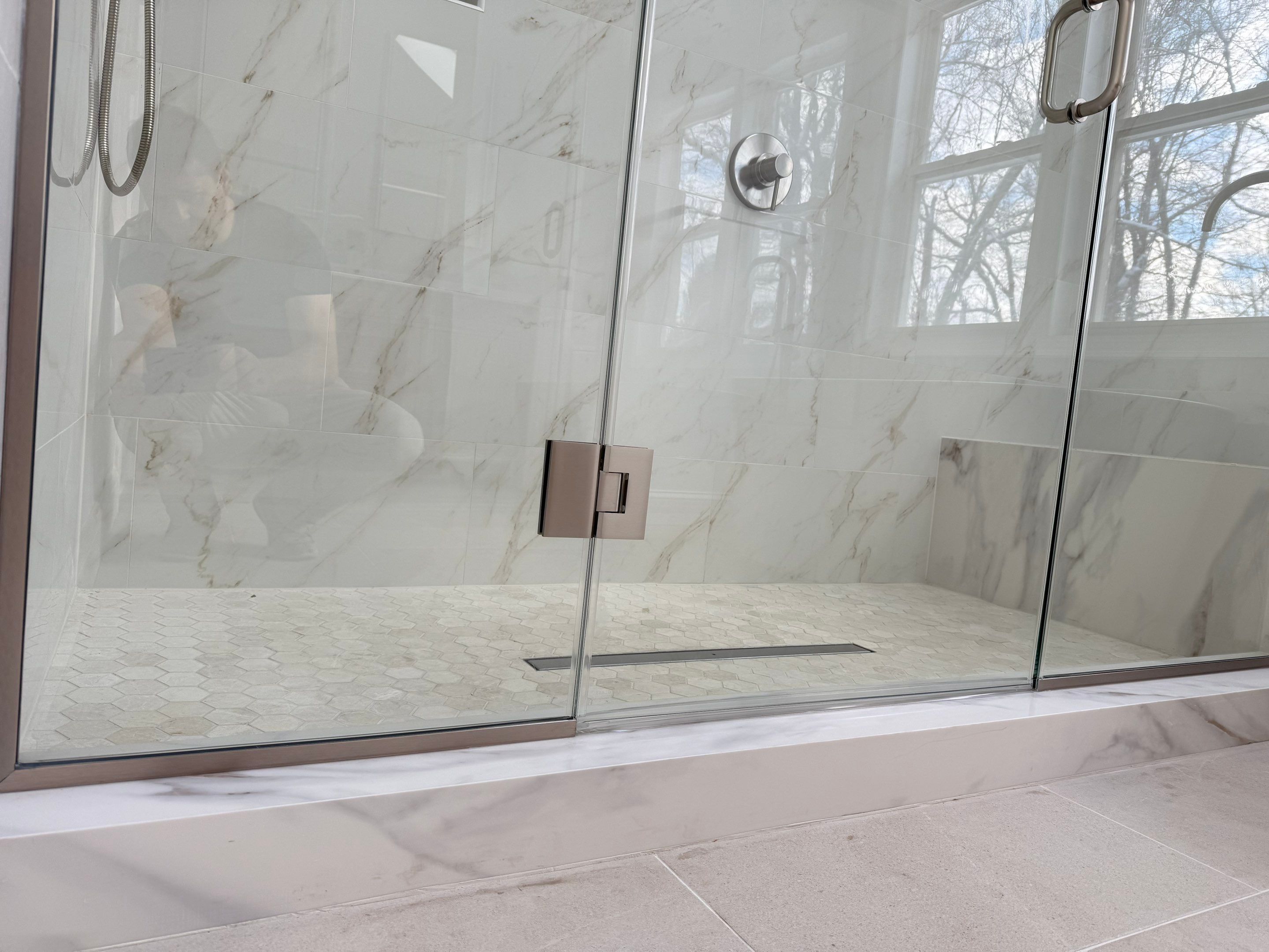 Bathroom Remodel using Tile by Home Concepts Construction