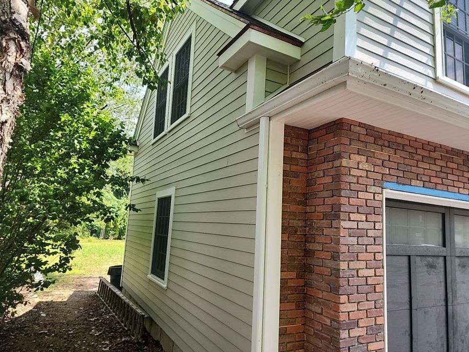 Siding on new construction in Brookline, MA by UBrothers Construction