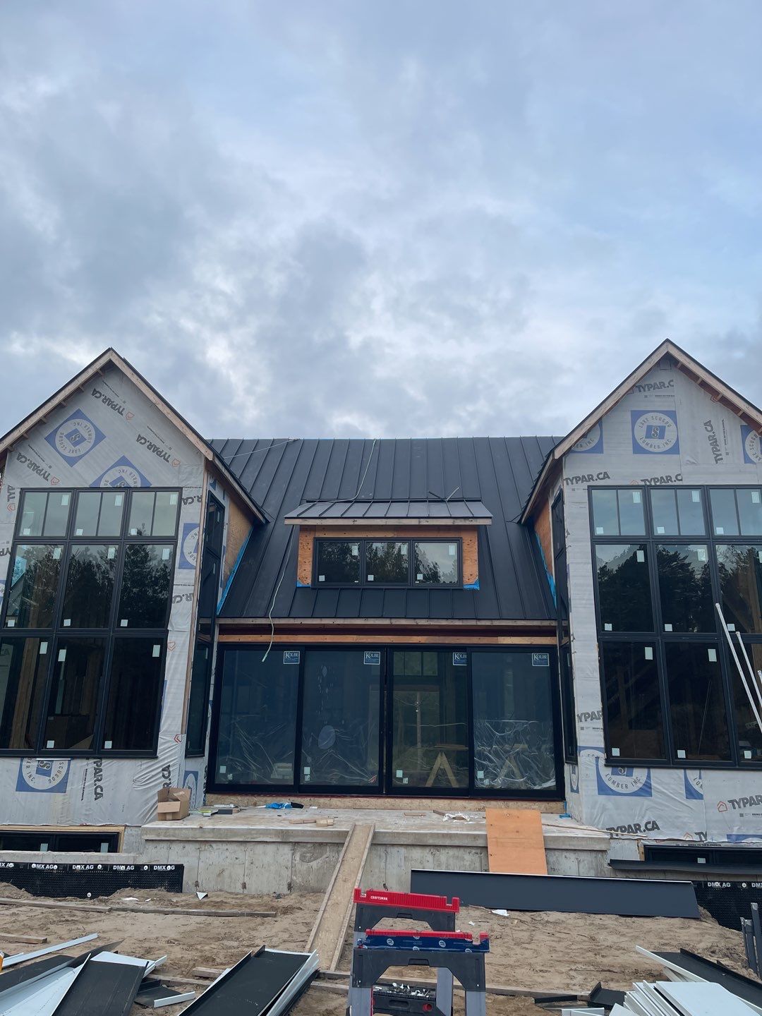 New Home Construction using 16" Standing Seam Panels by Jay Carter Roofing & Sheet Metal