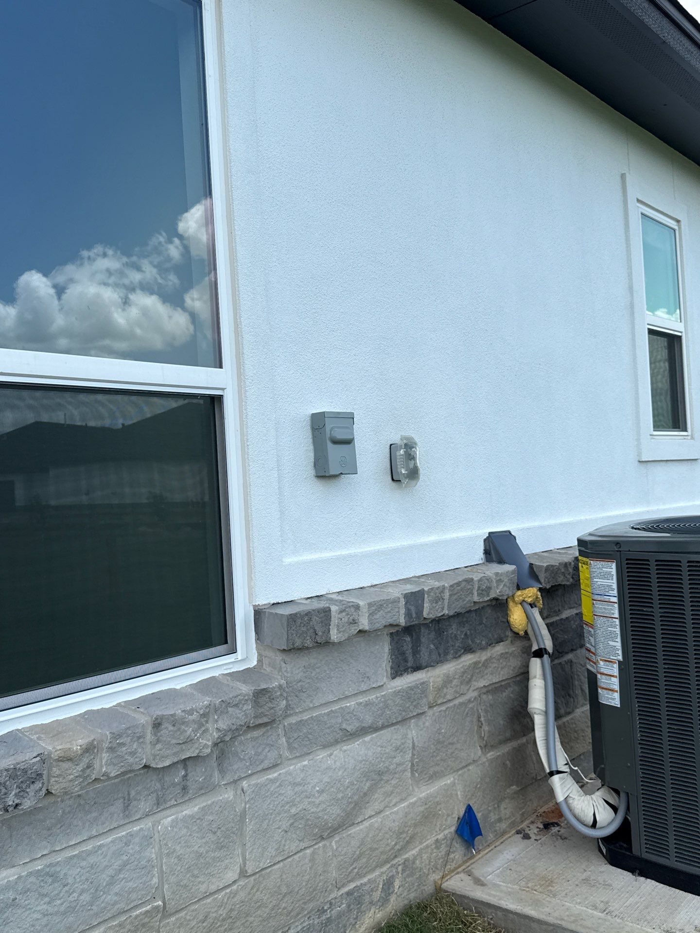 Waller Sophistication: Snowbound Color Stucco with Limestone Accents. by Apex Conventional Stucco Llc
