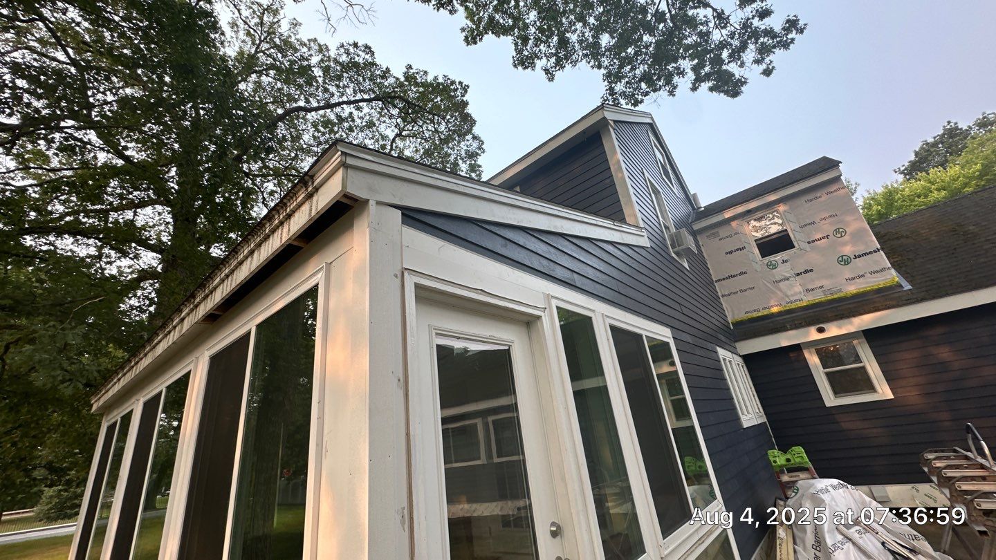 James Hardie Lap Siding Installation in Chelmsford, MA by Mighty Dog Roofing of Greater Middlesex County
