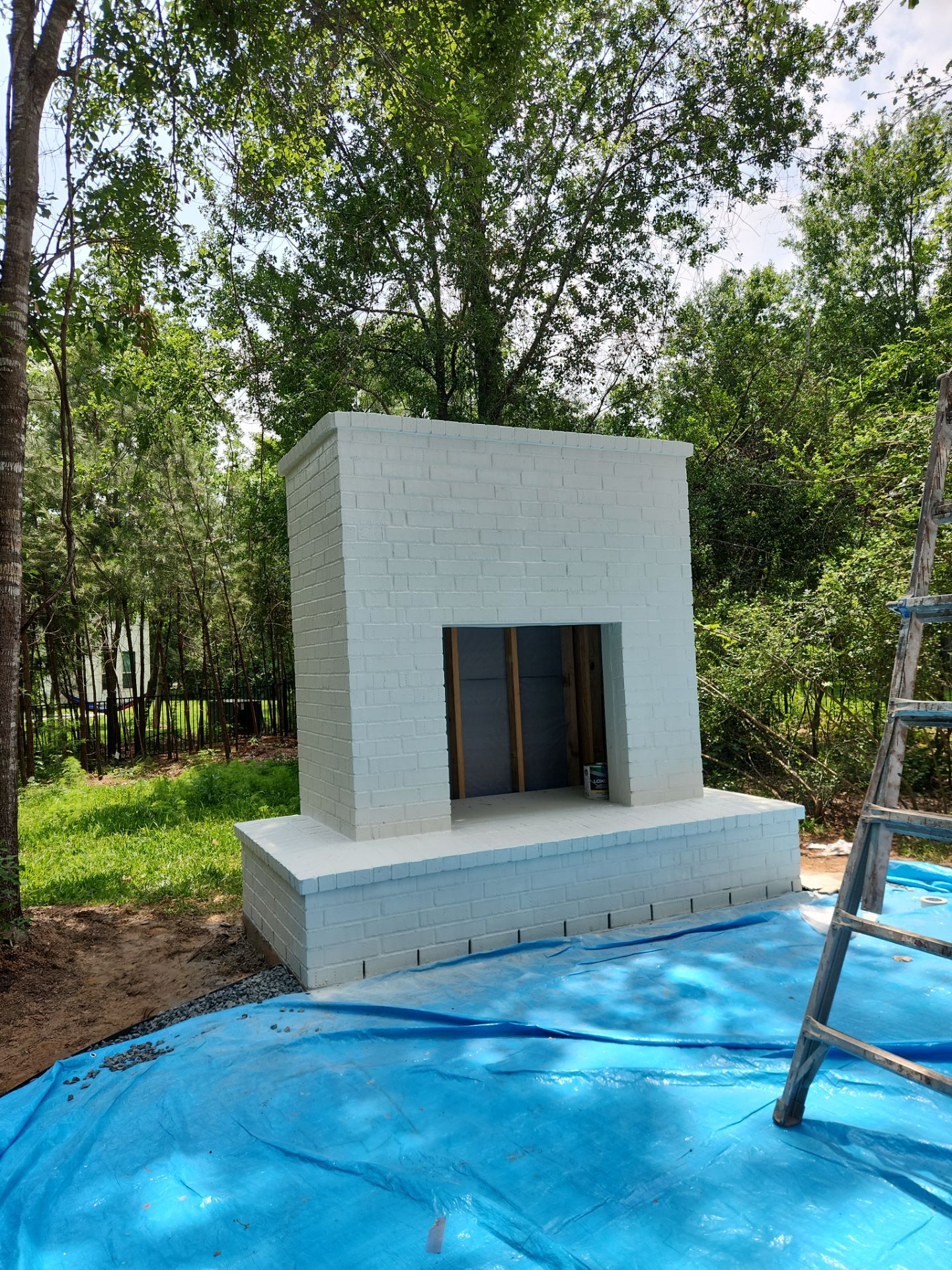 Outdoor Fireplace in Tomball, TX by SophAlx LLC