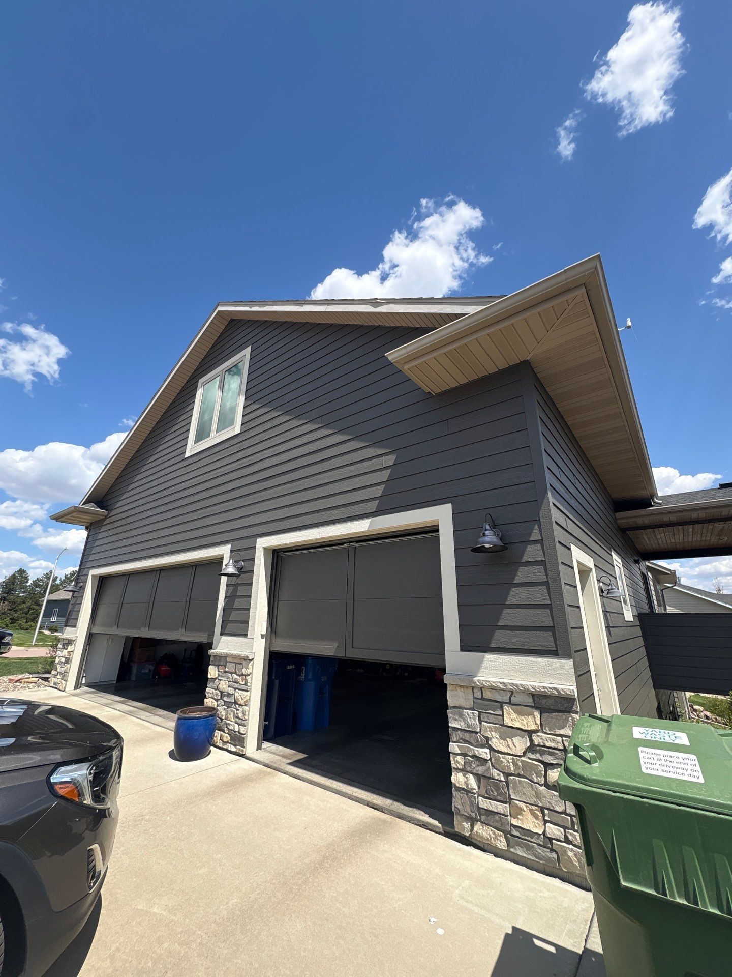 Residential Exterior Painting and Color Update in Sioux Falls by Select Painting, Coatings & Garage Cabinets