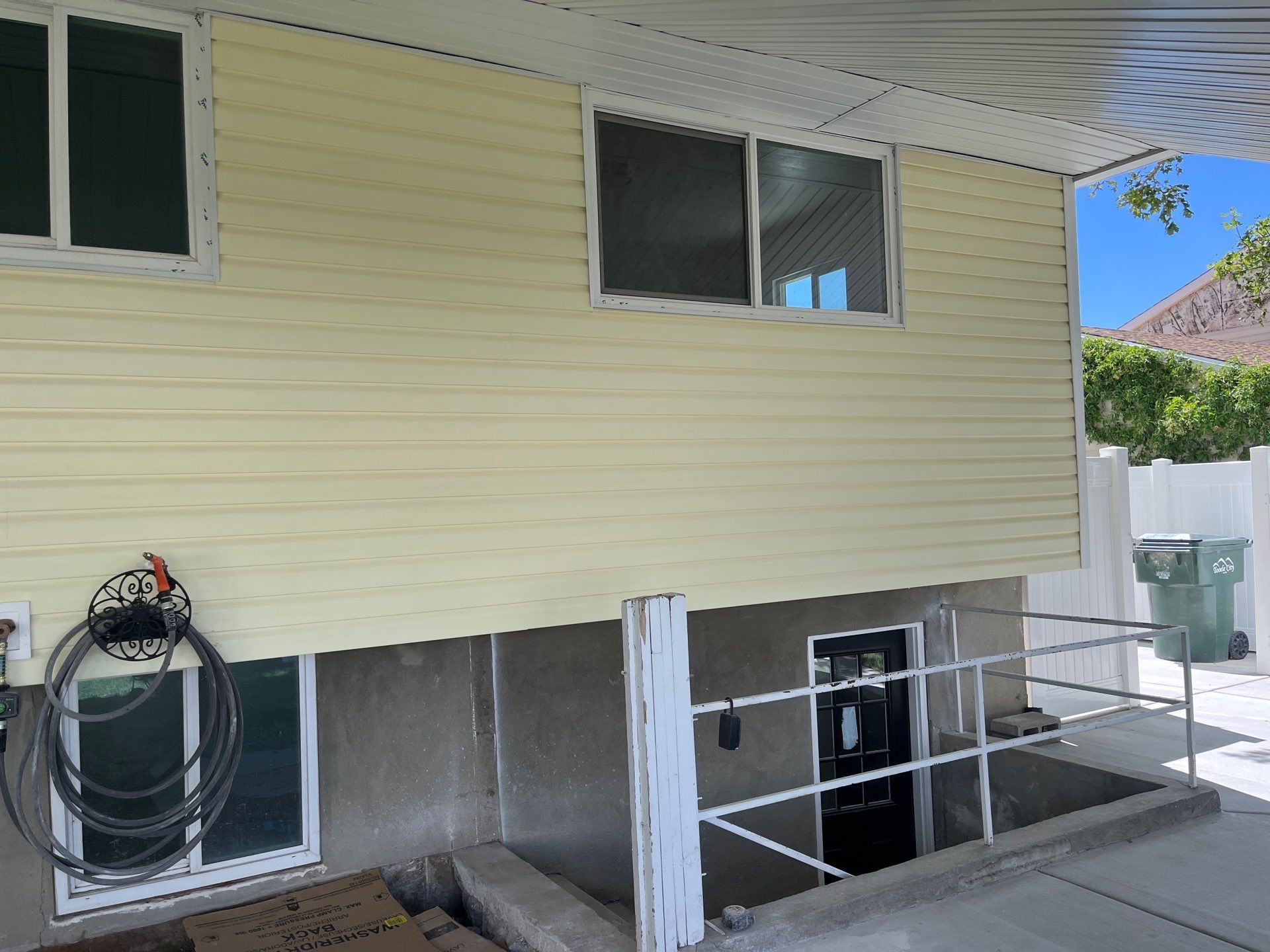 Tooele | Custom Color-Matched Vinyl & Hardie Upgrade | Colonial Yellow by Ideal Siding Utah