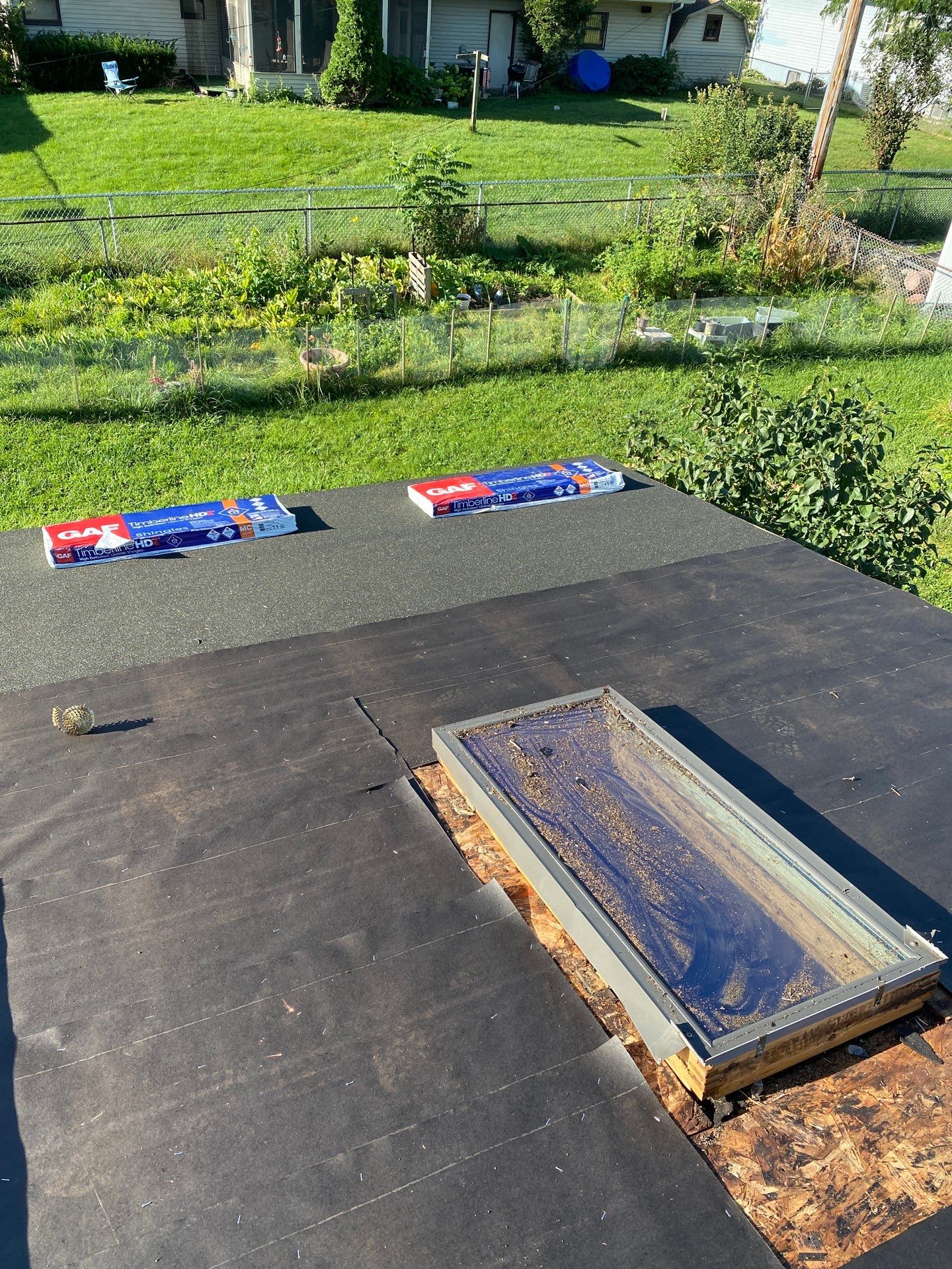 Asphalt Roof Replacement by Custom Installations