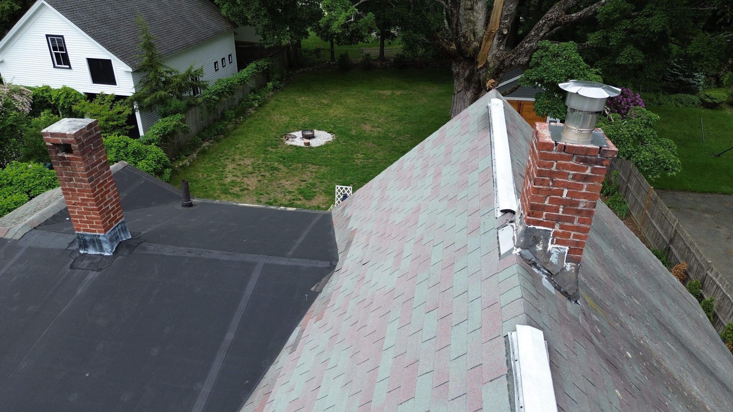 Full Roof Replacement + Custom Gutter Install | Onyx Black Finish by Mighty Dog Roofing of Greater Middlesex County
