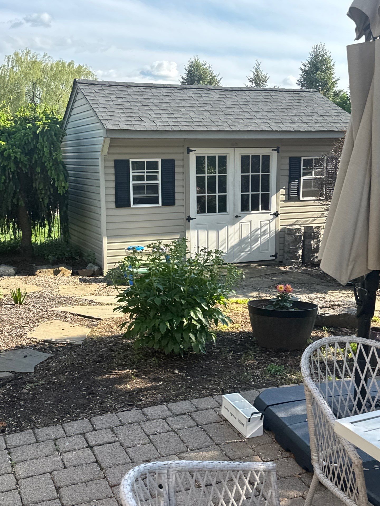 Backyard Retreat: Techo-Bloc Patio + Firepit Lounge by Saylor’s Lawn & Landscape