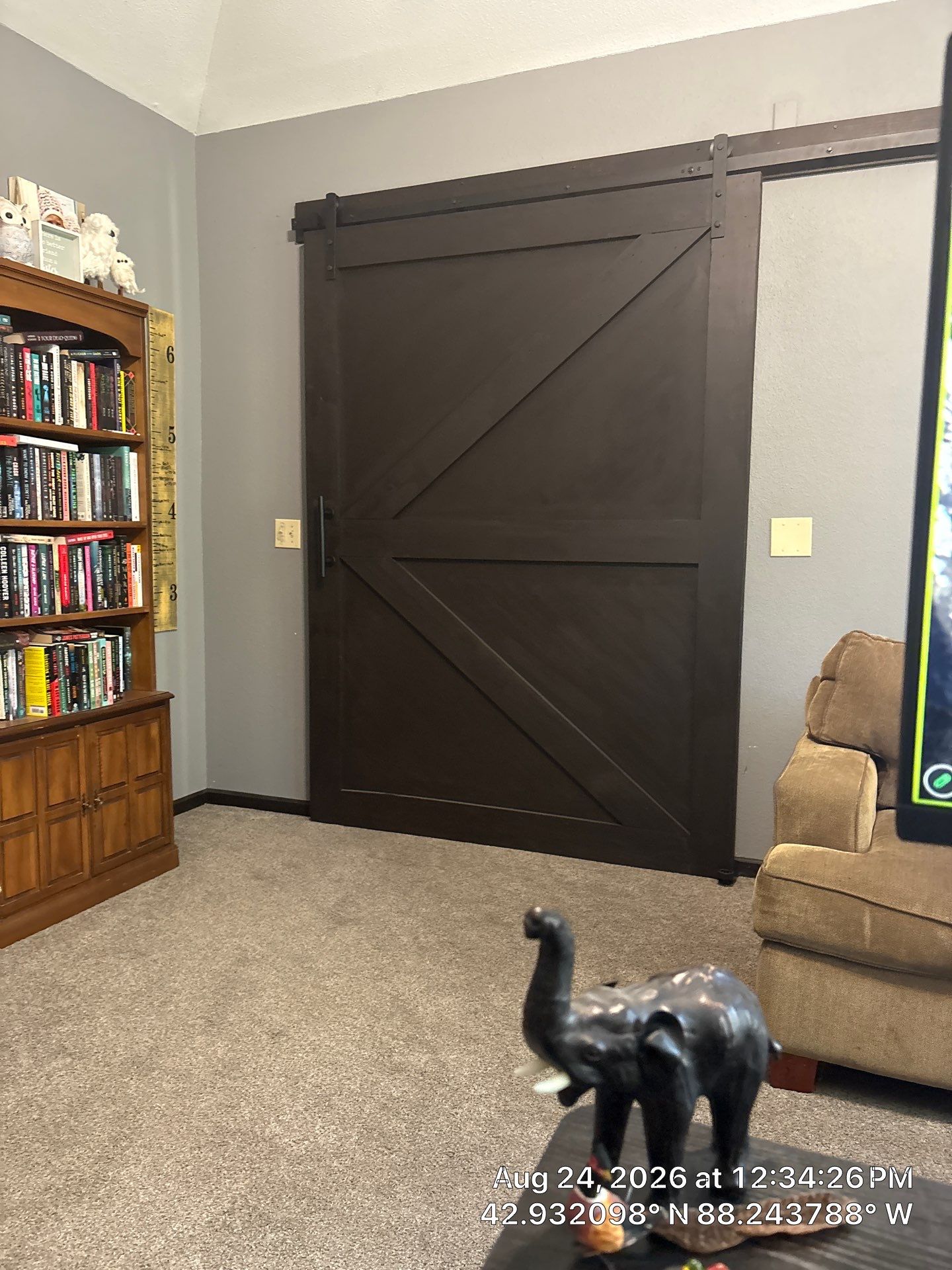 Dark Stained Sliding Barn Door Installation in Waukesha by CompanyCam Sales Demo