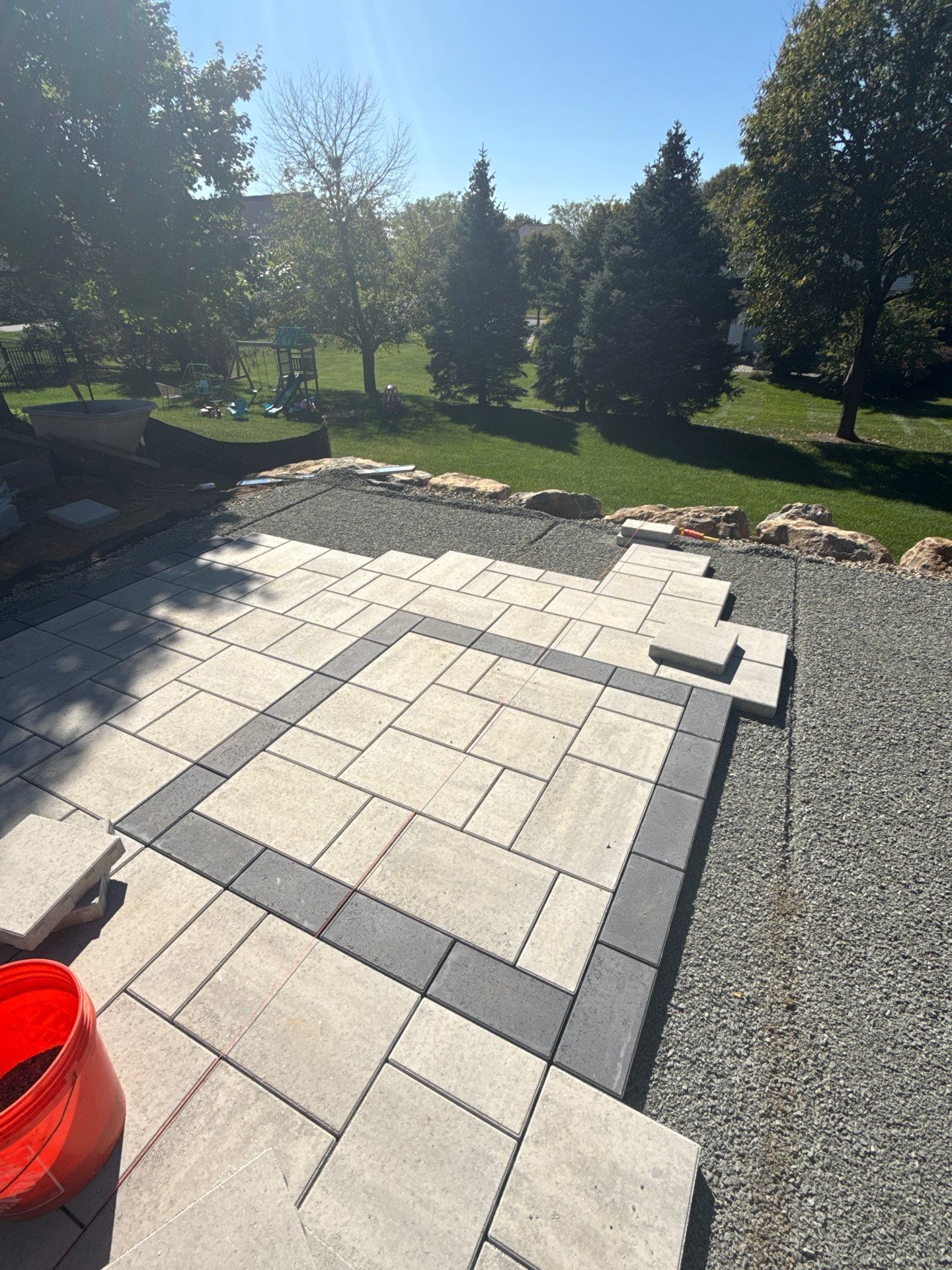 Backyard Retreat: Techo-Bloc Patio + Firepit Lounge by Saylor’s Lawn & Landscape