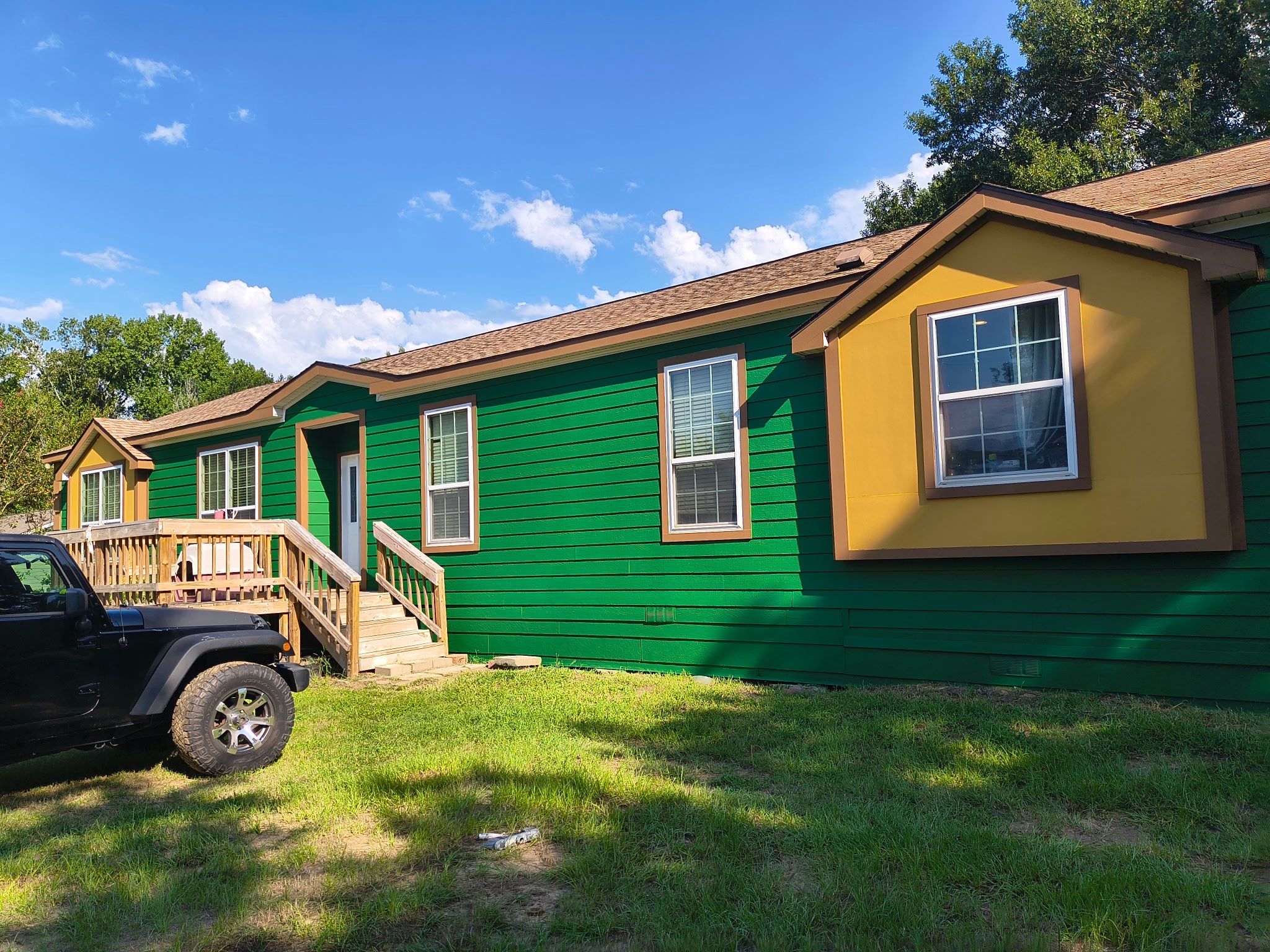 Exterior Painting in Lindale, TX | Bright Green Wood House Repaint by Quality Coats Painting